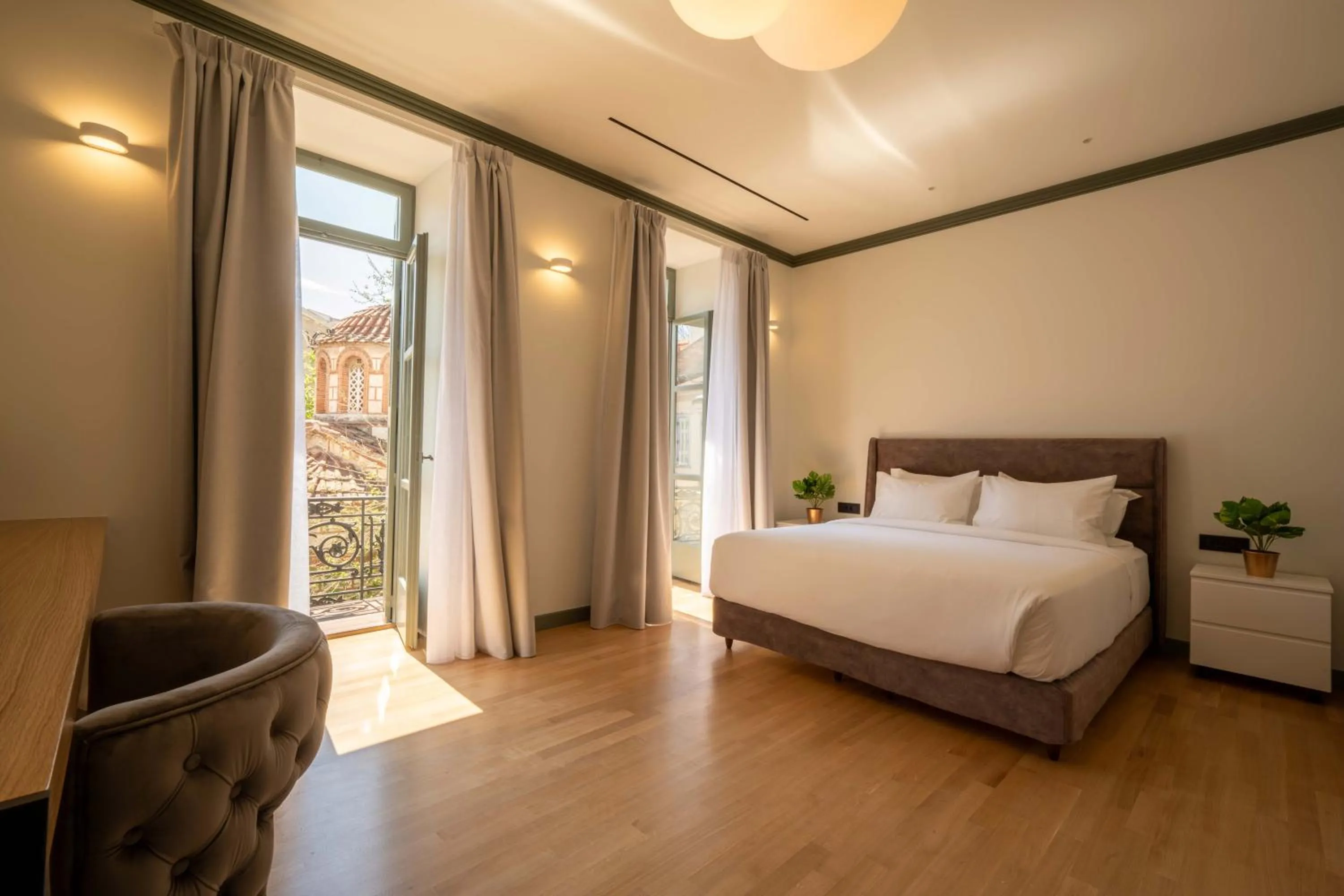 Bed in Whisper Athens Suites