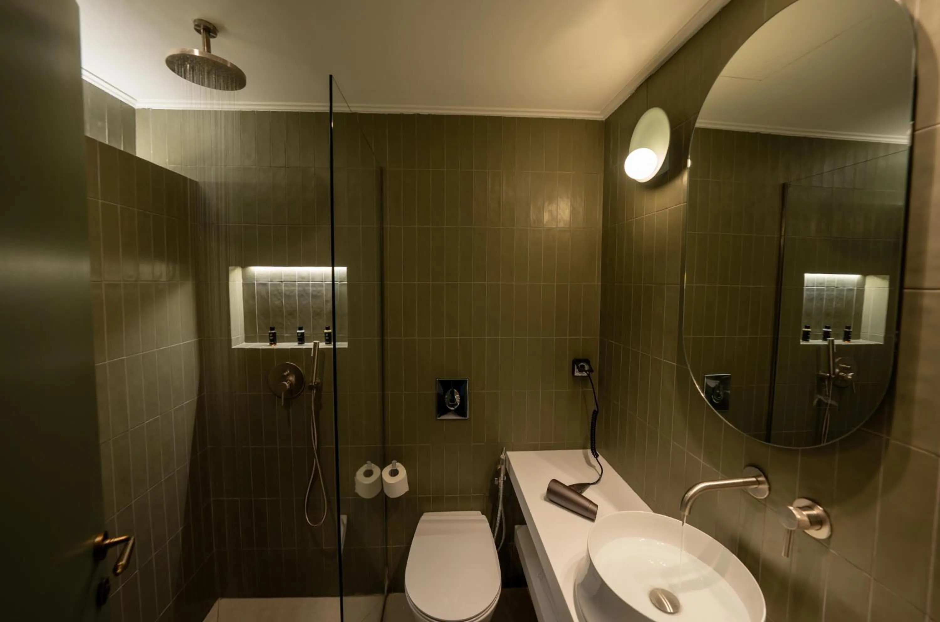 Bathroom in Whisper Athens Suites