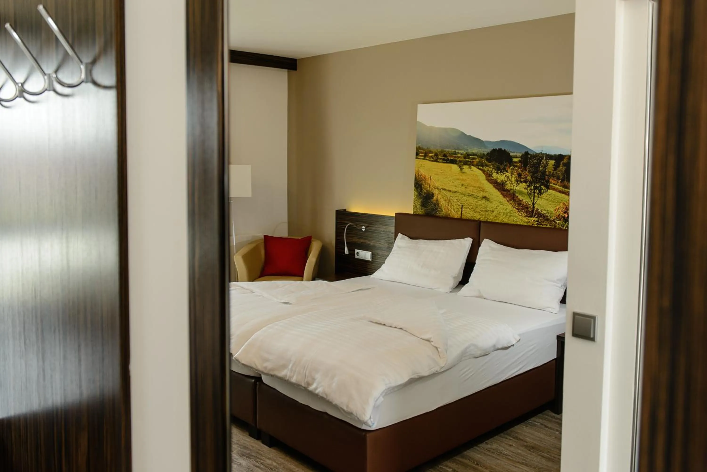 Photo of the whole room, Bed in Dorfmeister Business Hotel B&B