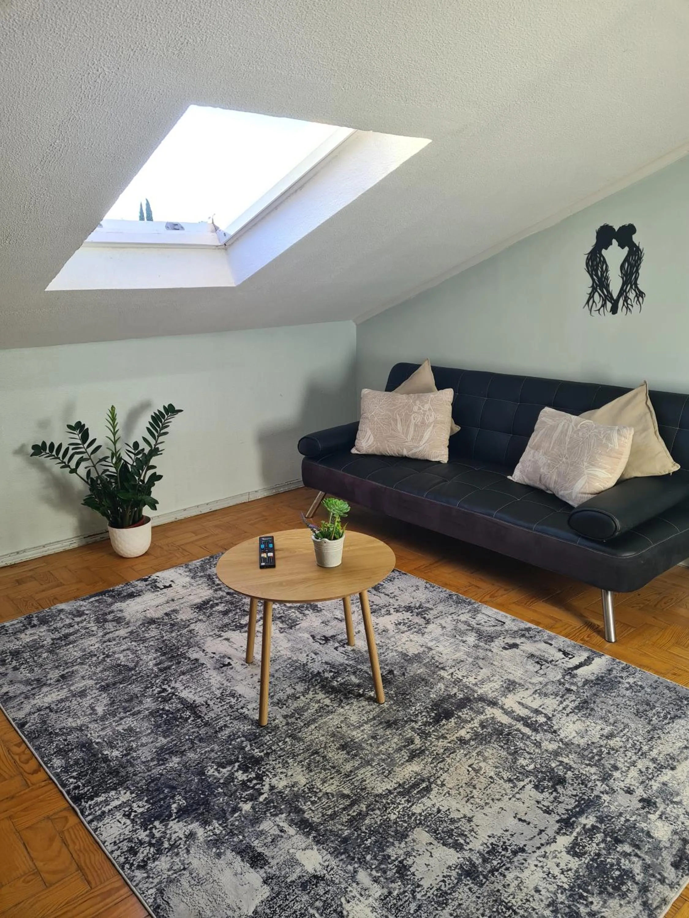 Living room in Hostel Jardins de São Luís