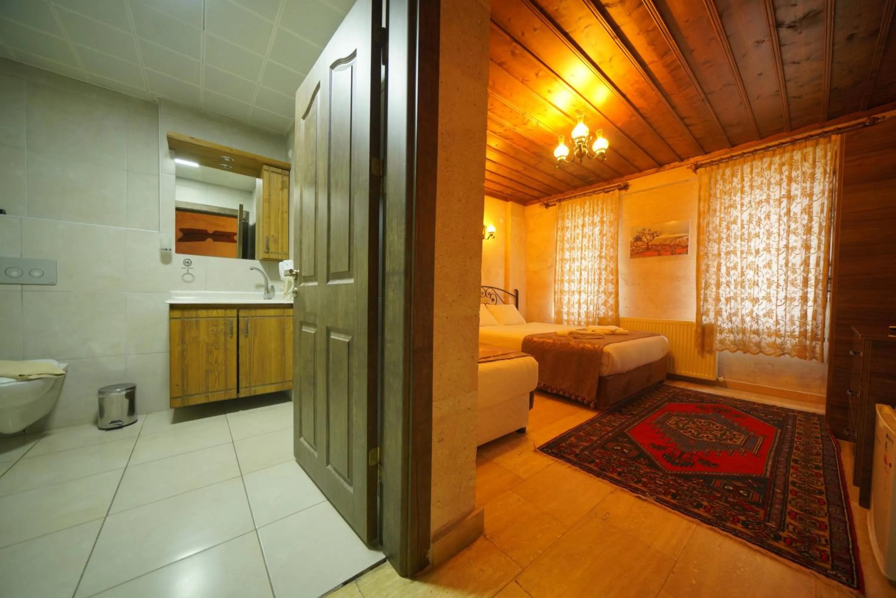 Toilet, Bed in Goreme Cave Rooms&Pool