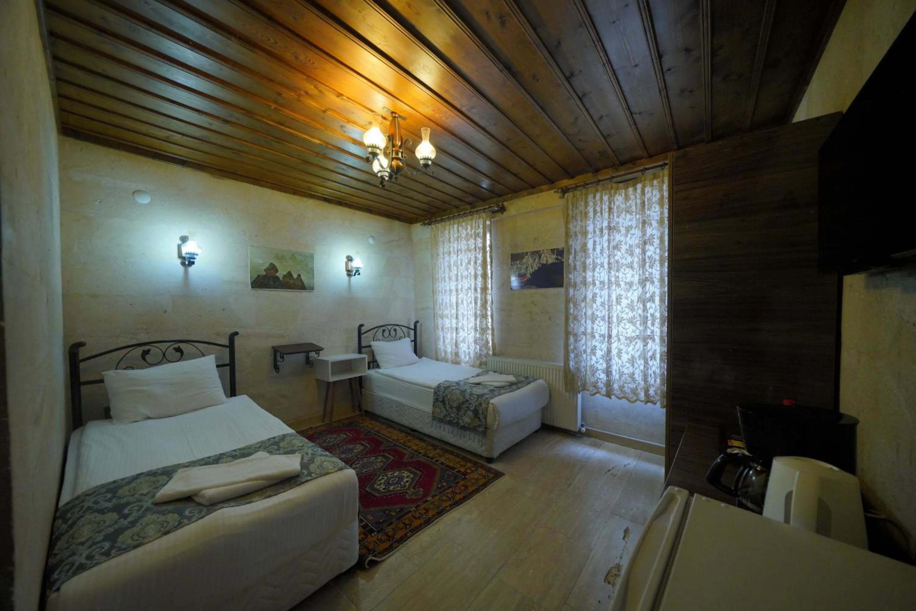 Bed in Goreme Cave Rooms&Pool