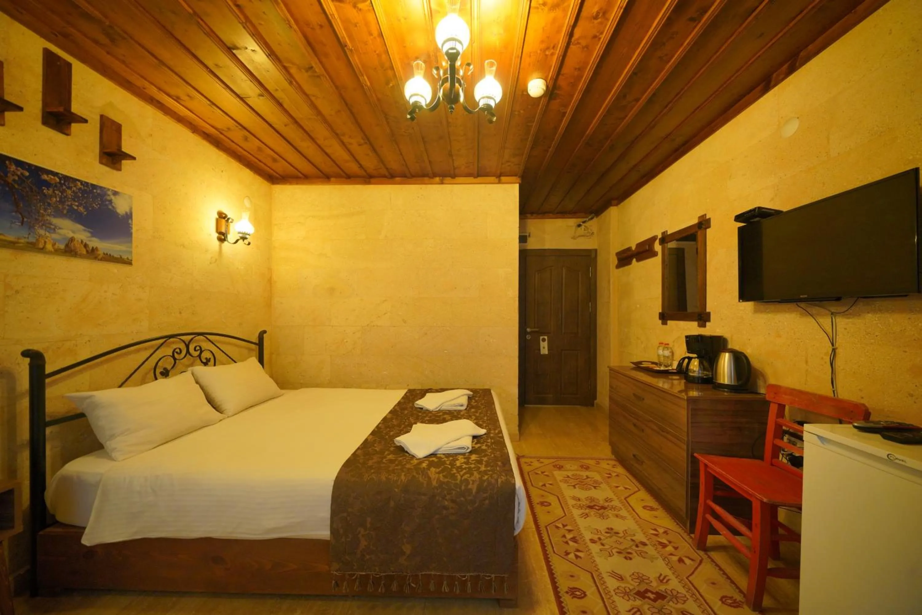 Bed in Goreme Cave Rooms&Pool