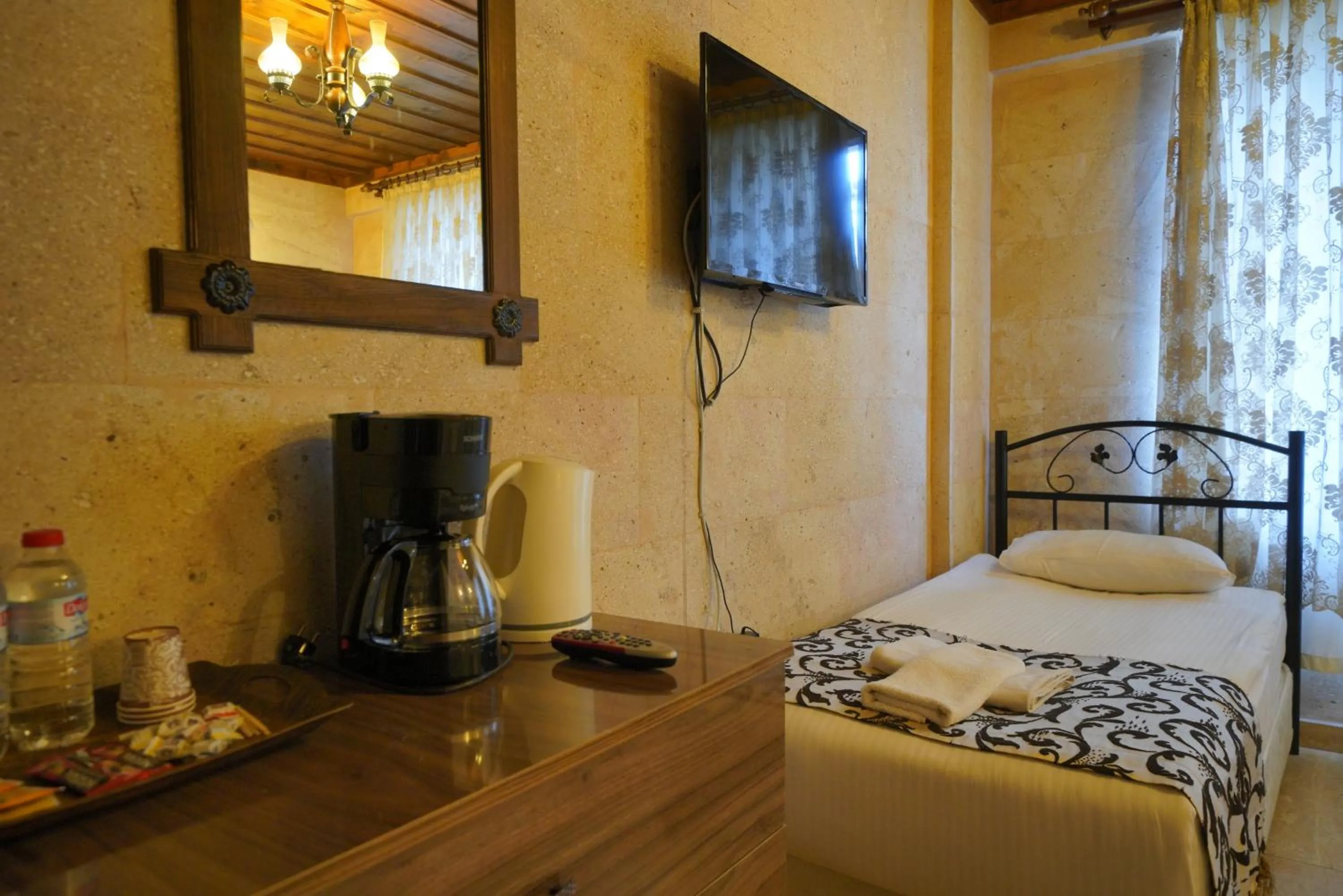 Bed in Goreme Cave Rooms&Pool