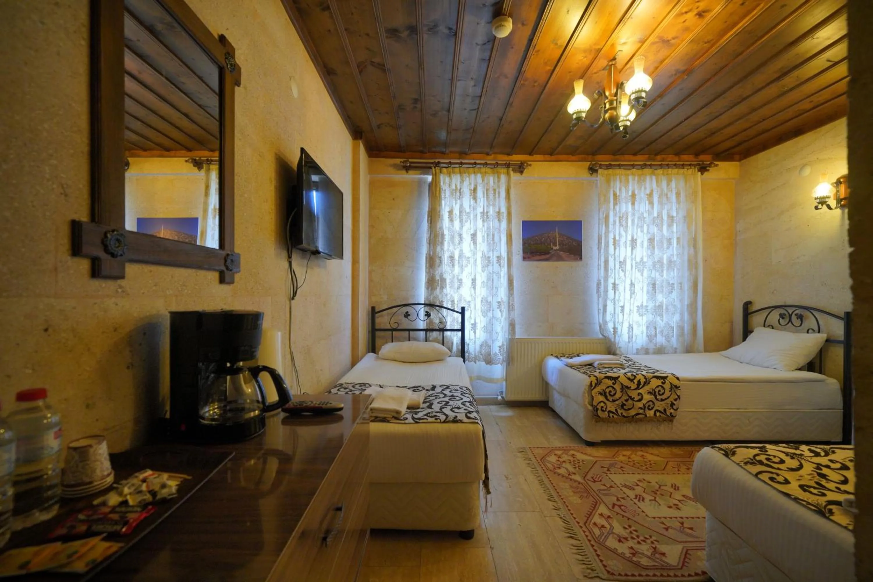 Bed in Goreme Cave Rooms&Pool