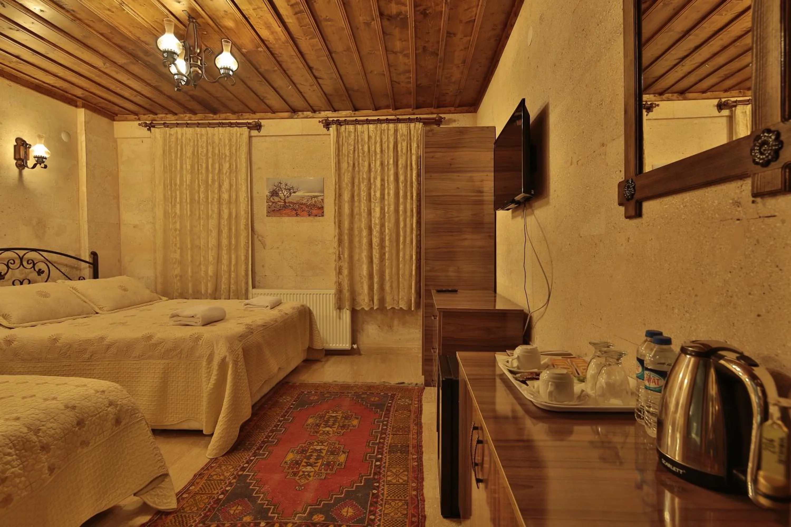 Bed in Goreme Cave Rooms&Pool