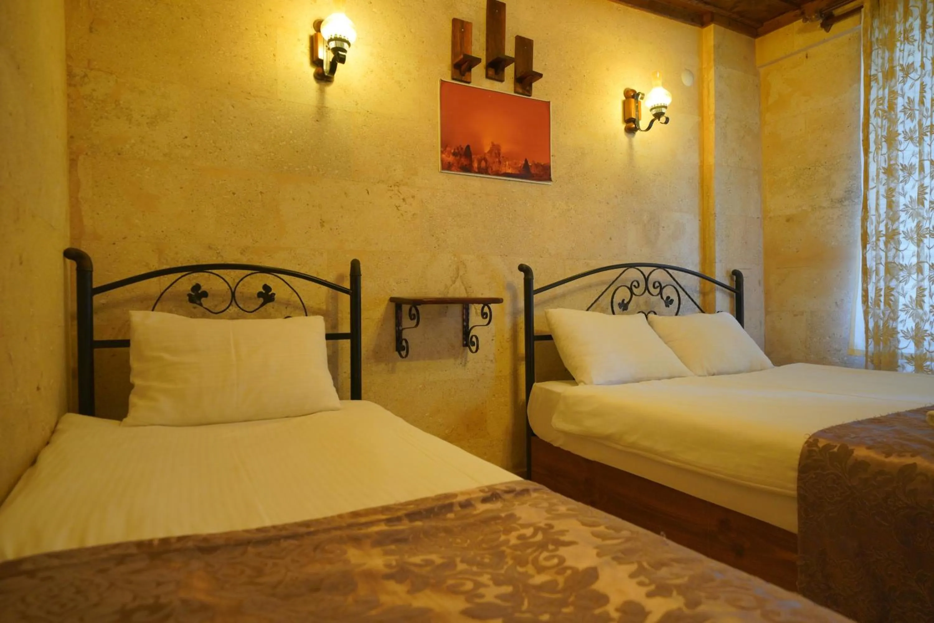 Bed in Goreme Cave Rooms&Pool