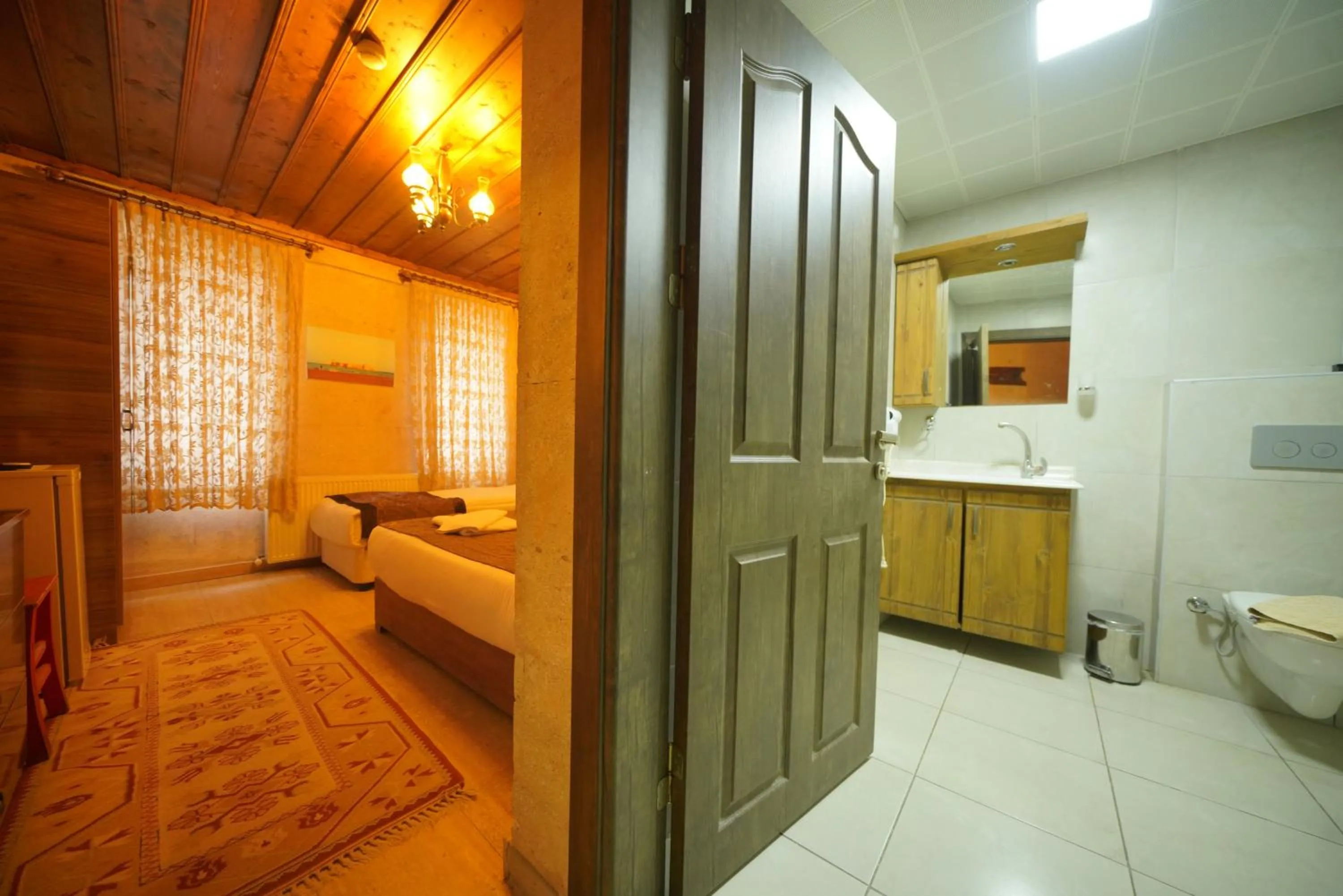 Toilet, Bed in Goreme Cave Rooms&Pool