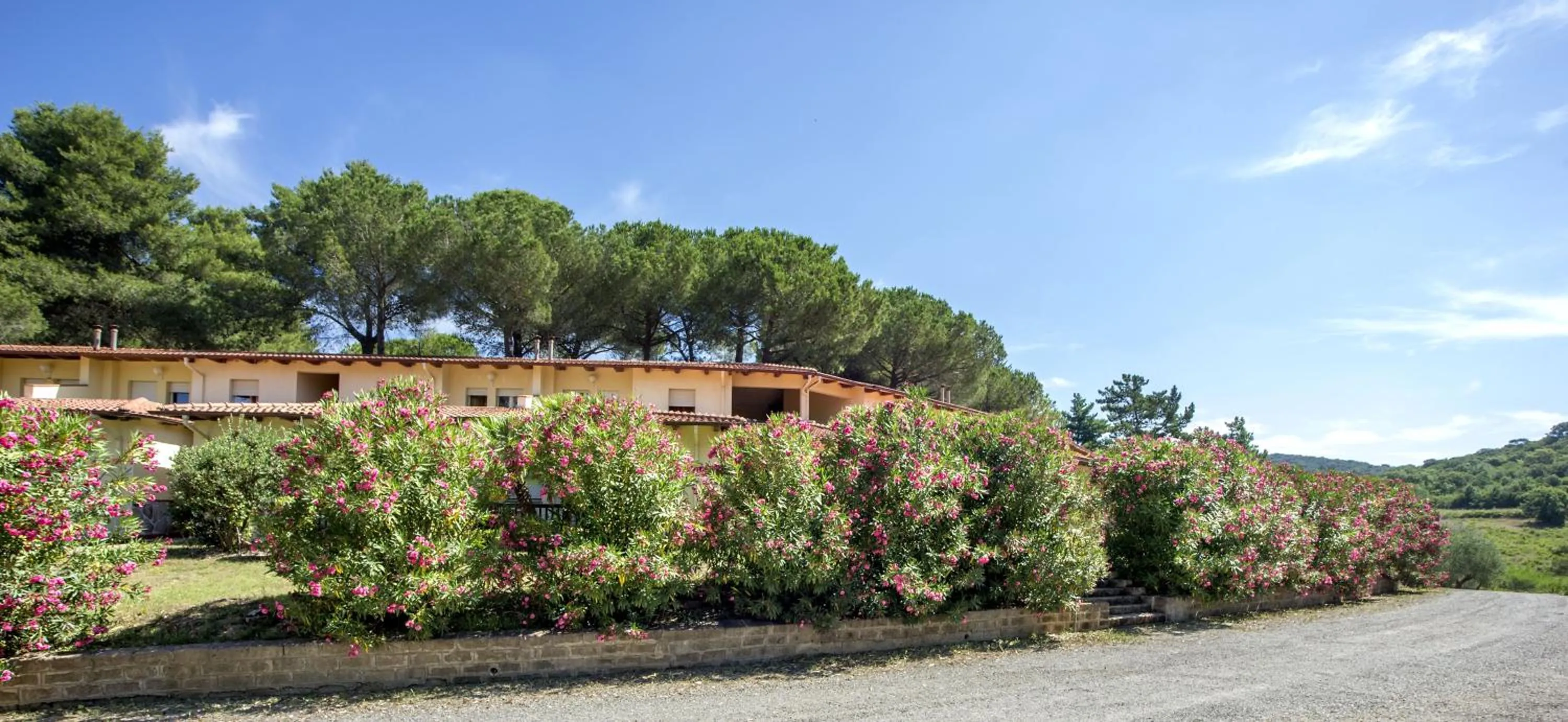 Property building in Il Pelagone Hotel & Golf Resort Toscana