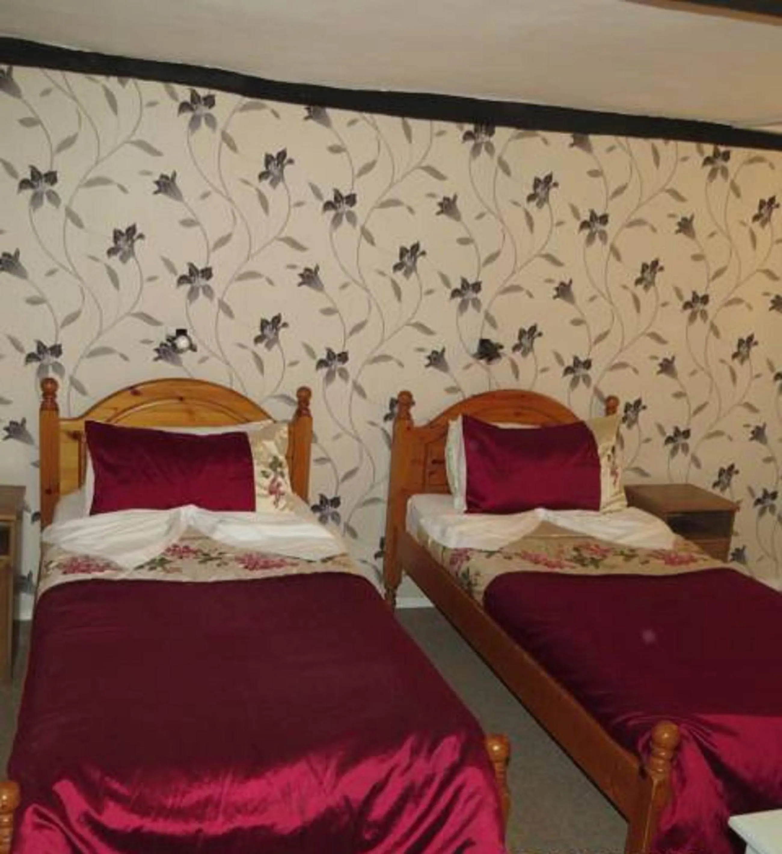 Decorative detail, Bed in The Old Black Horse Inn