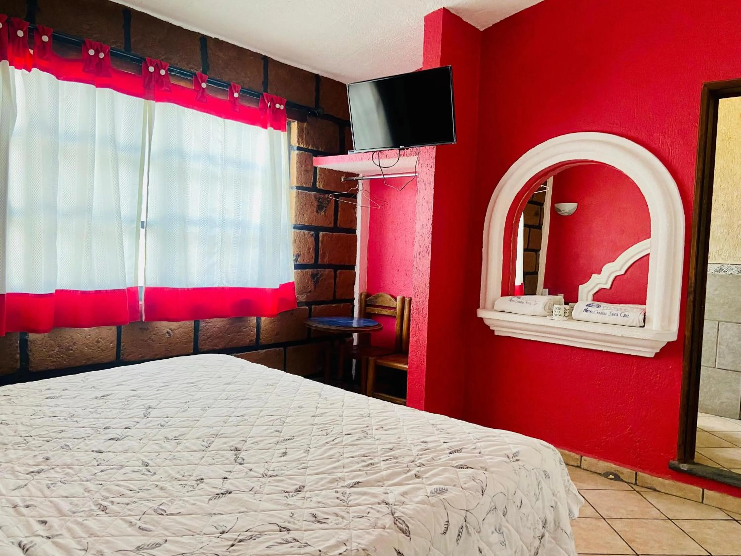 Bed in Hotel Sta Cruz Oaxtepec