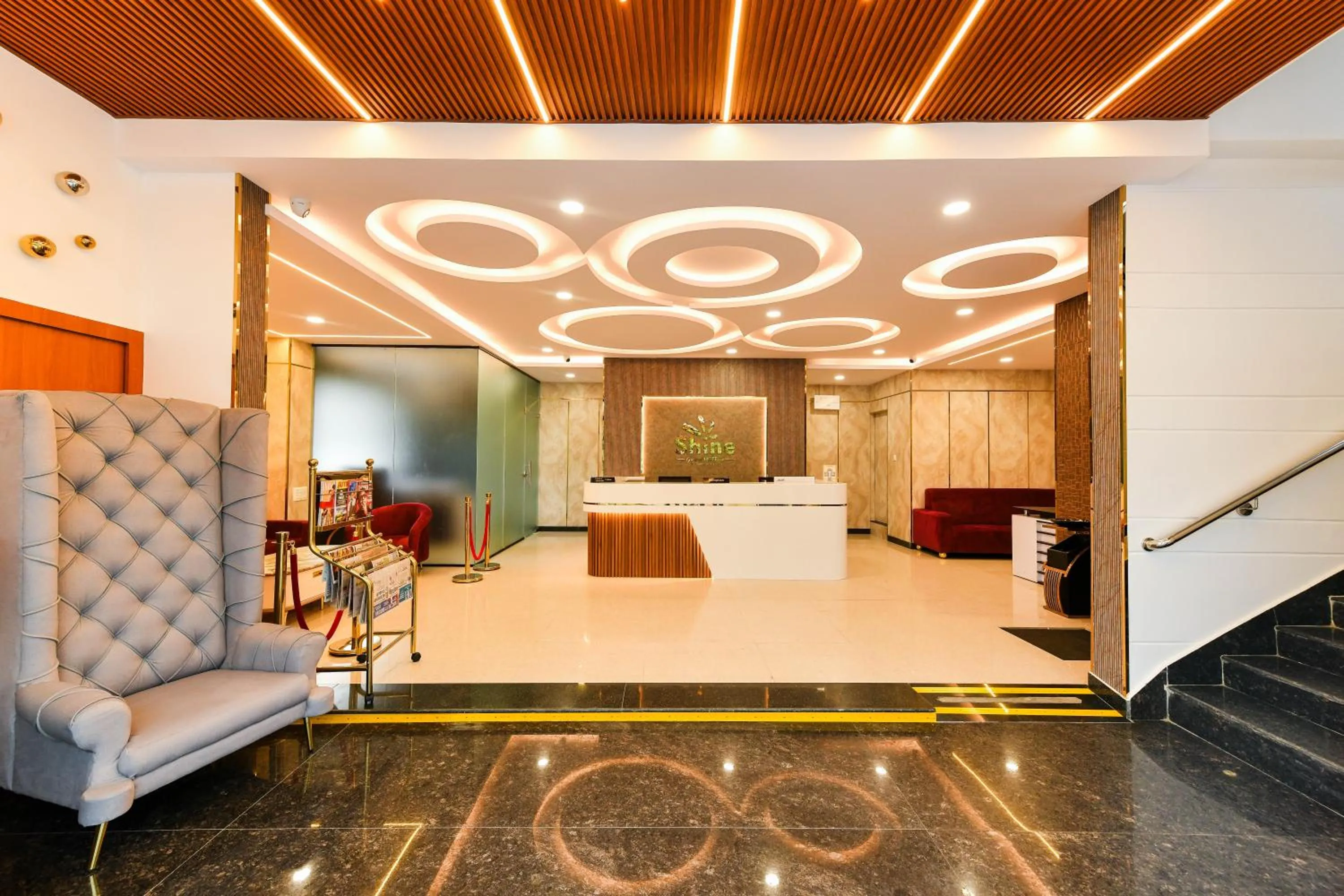 Lobby or reception, Bed in Hotel Shine International