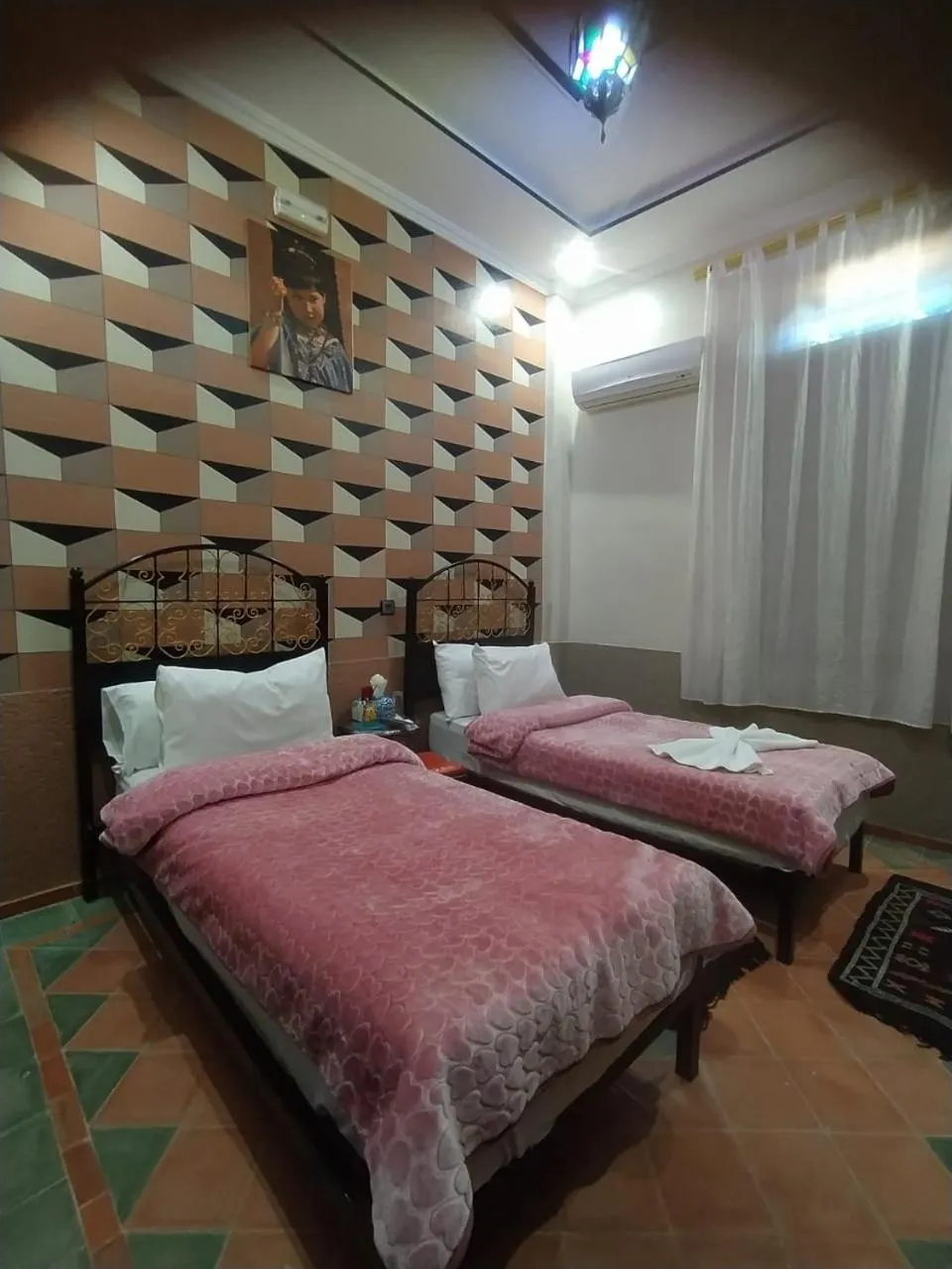 Bed in Hôtel La Vallée Des Oiseaux