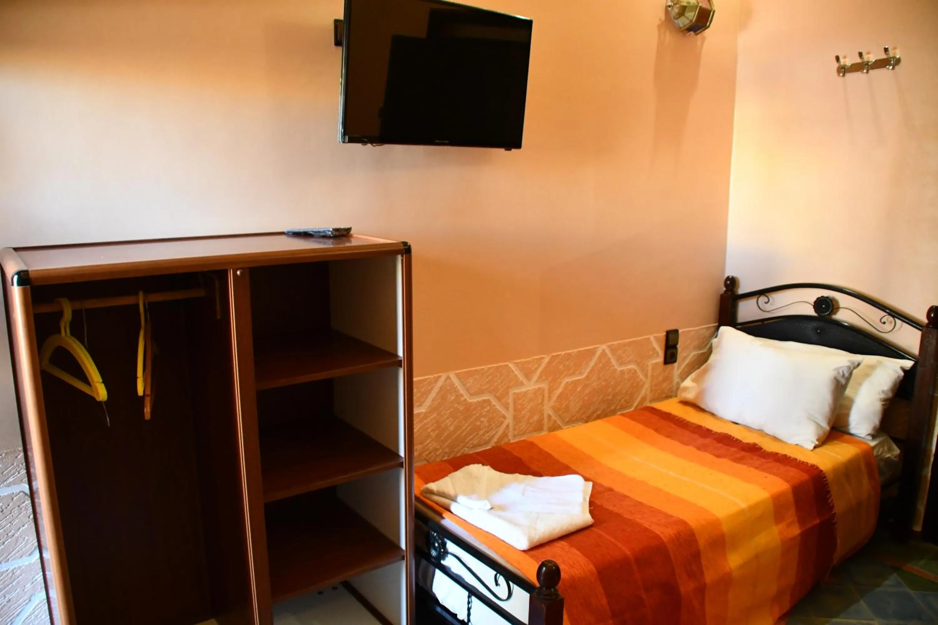 Bed in Hôtel La Vallée Des Oiseaux