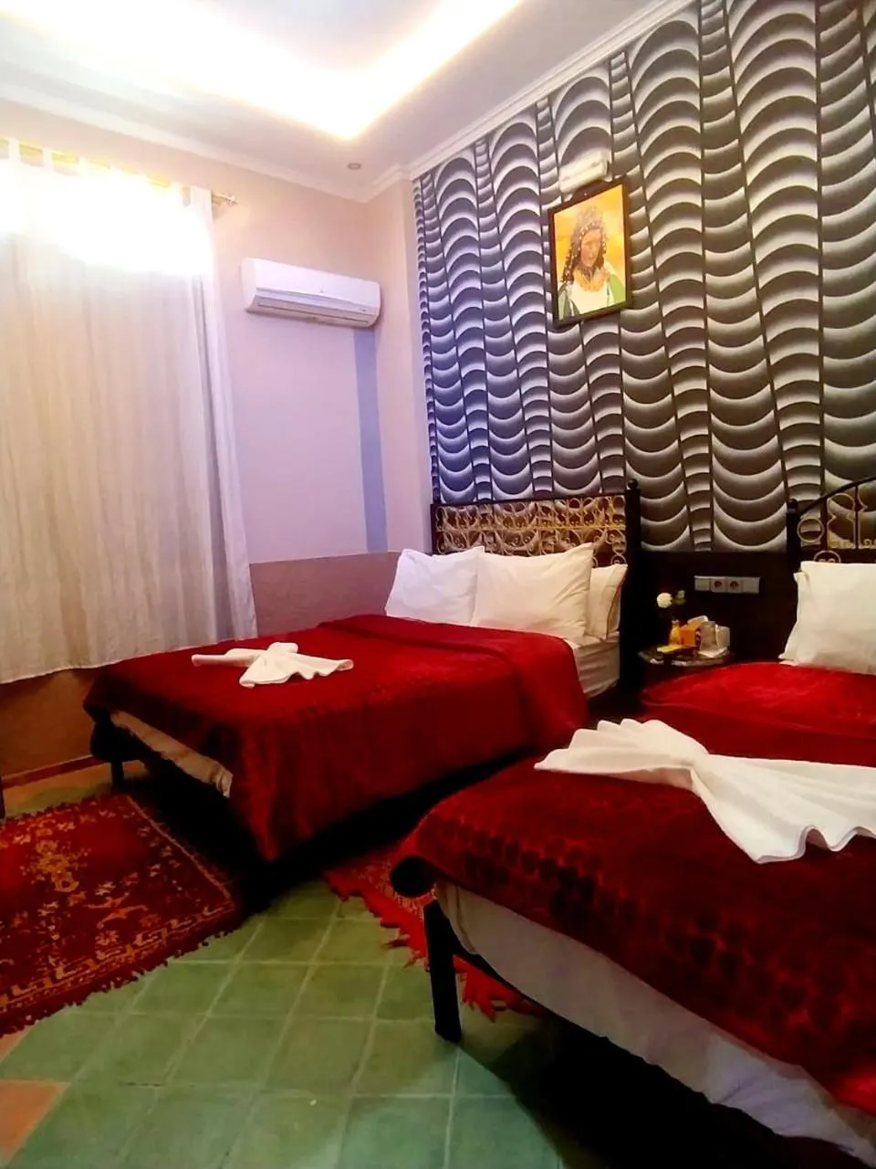 Bed in Hôtel La Vallée Des Oiseaux