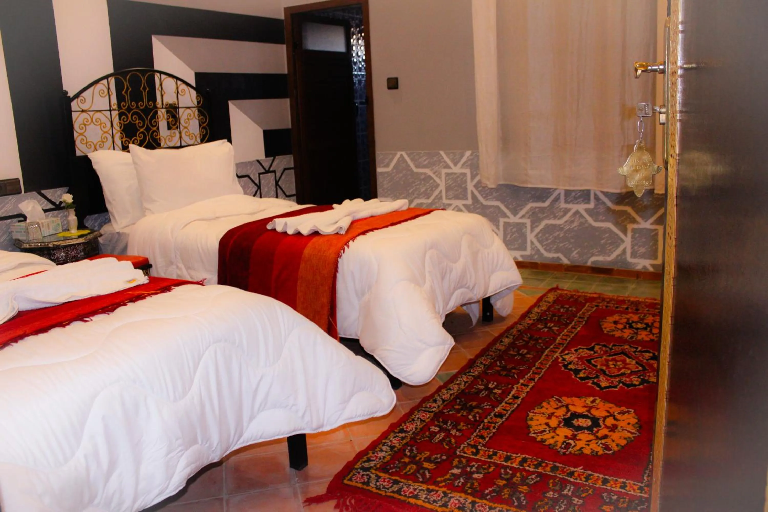 Bed in Hôtel La Vallée Des Oiseaux