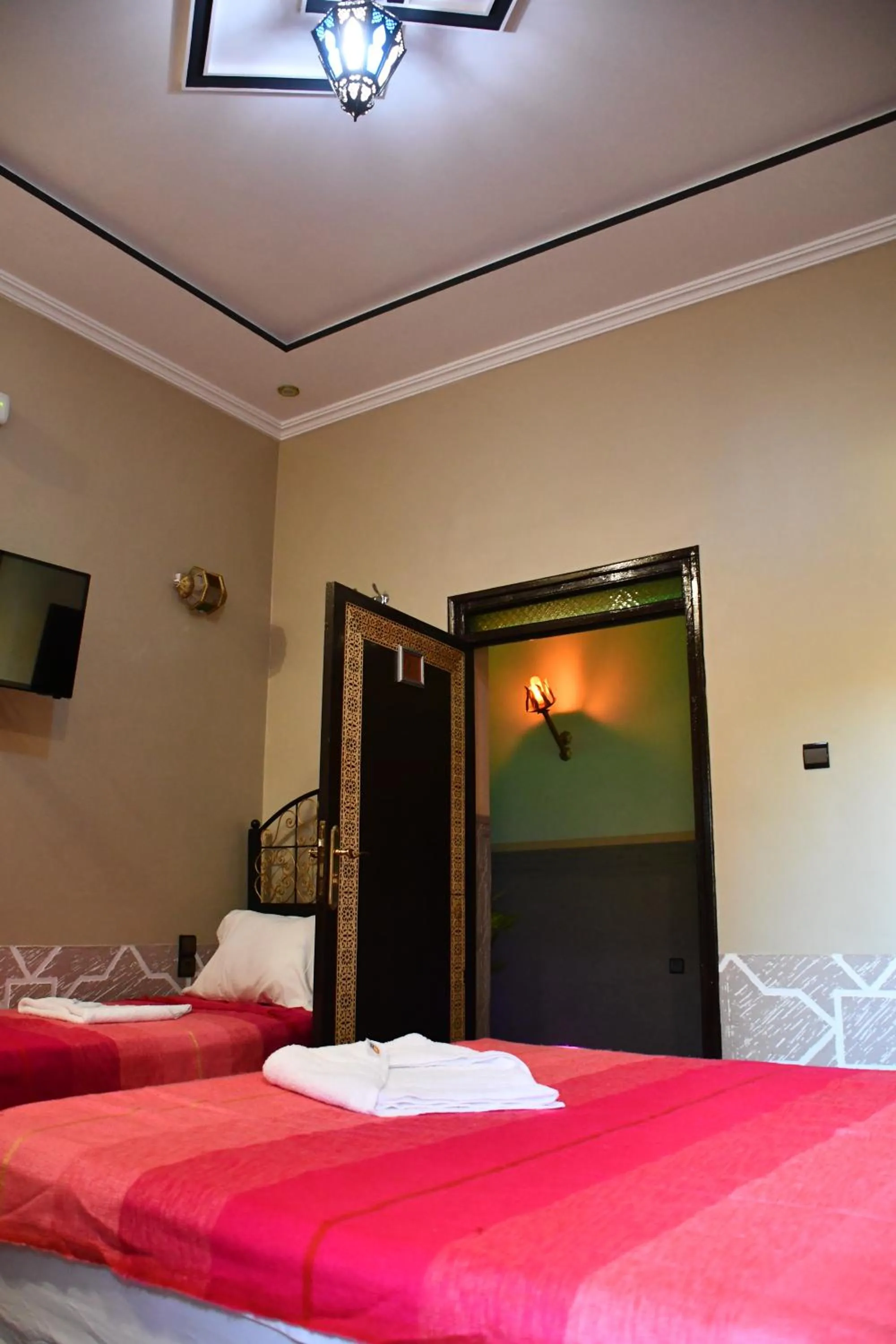 Bed in Hôtel La Vallée Des Oiseaux