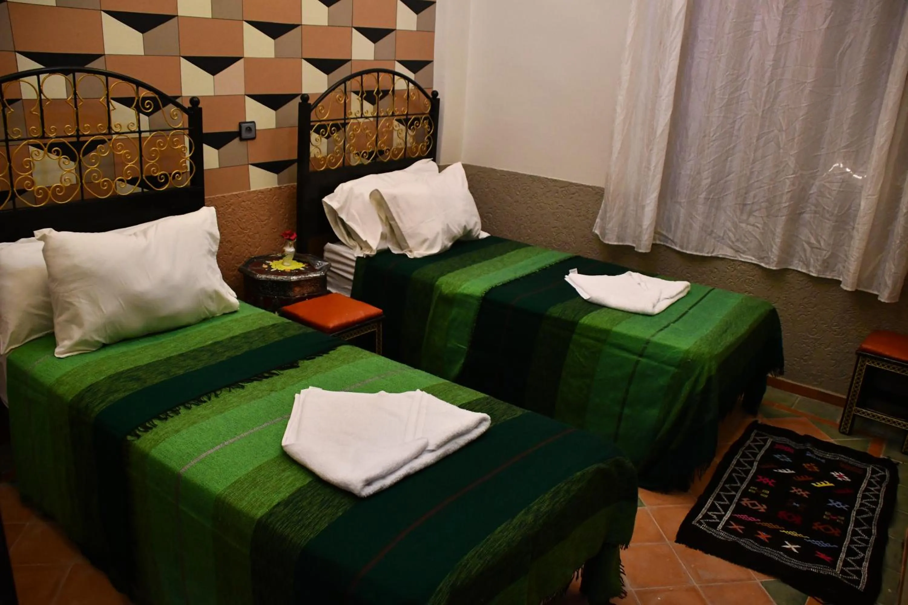 Bed in Hôtel La Vallée Des Oiseaux