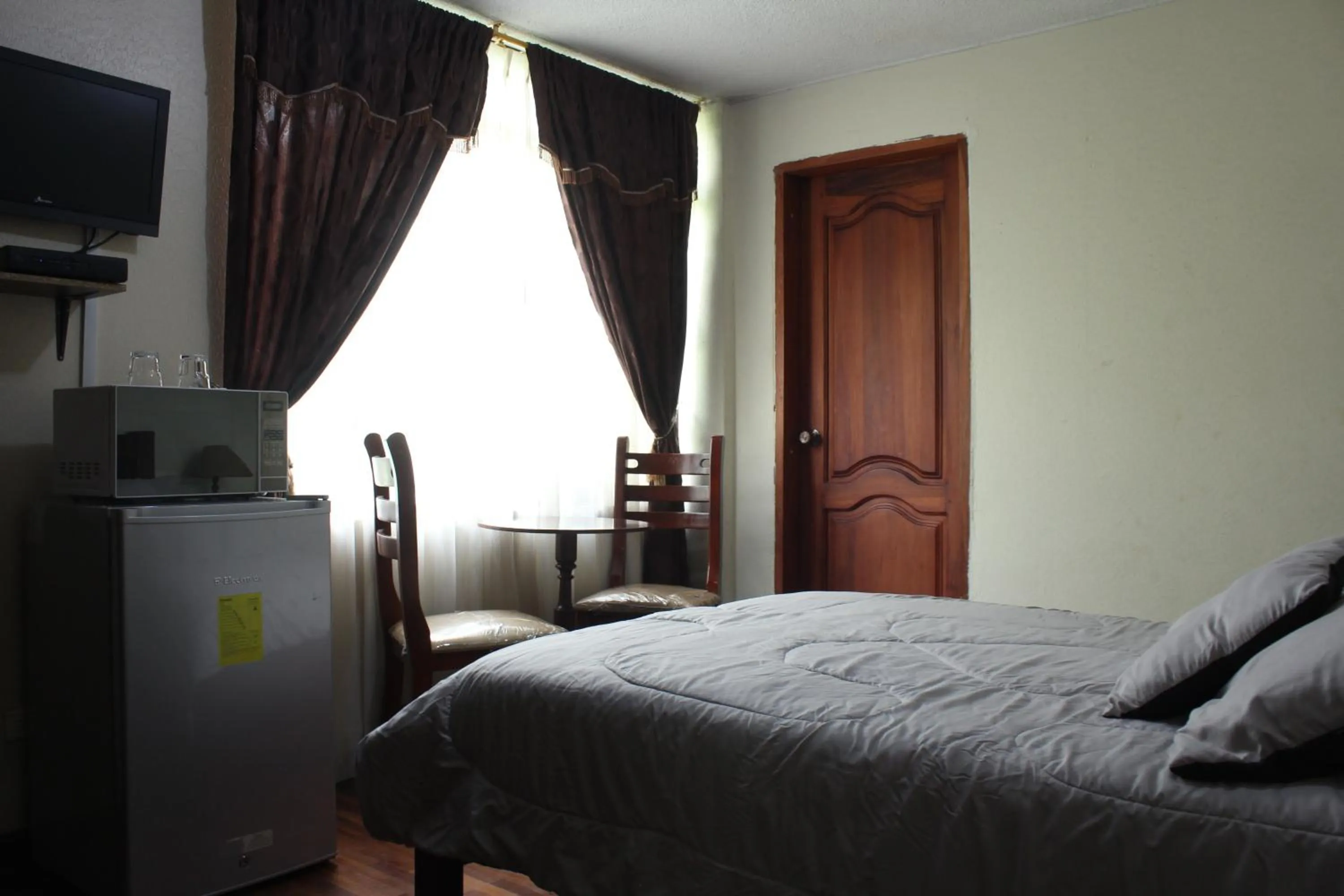 Bedroom, Bed in Altura Rooms & Suites