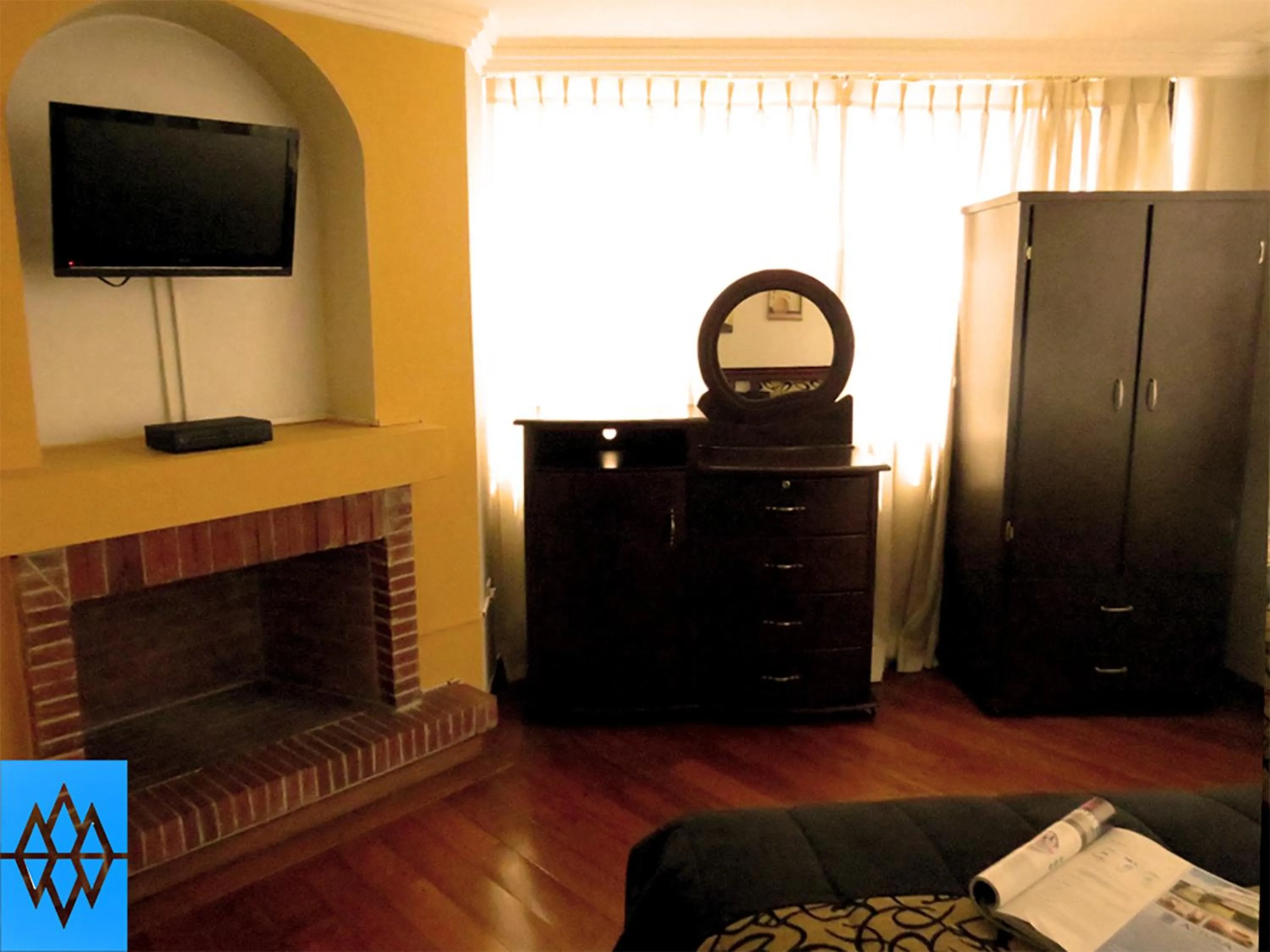 Bedroom in Altura Rooms & Suites