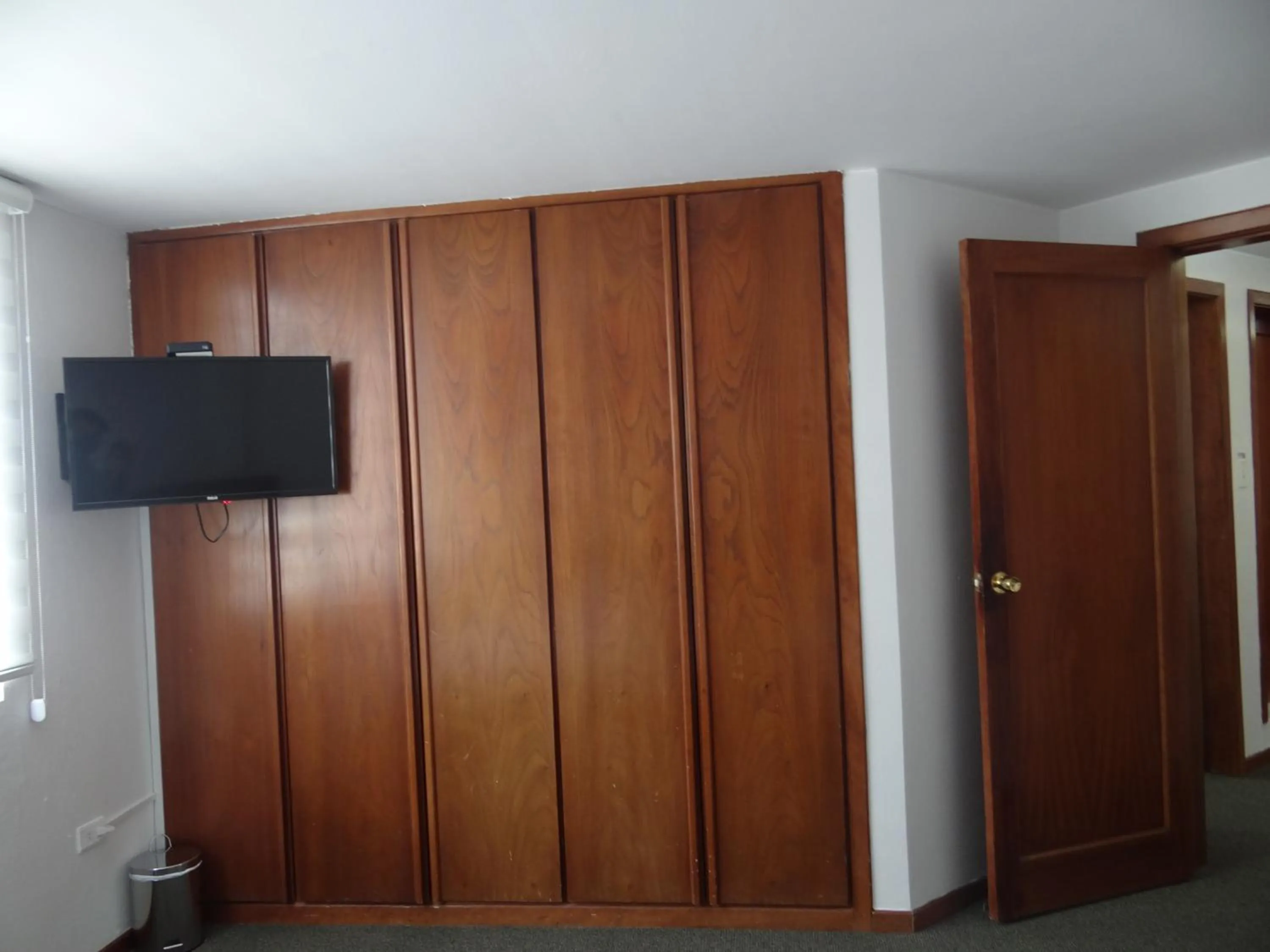 wardrobe in Altura Rooms & Suites