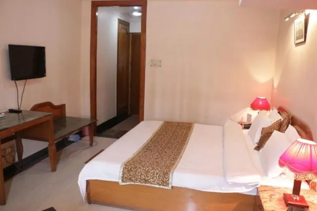 Bed in Hotel Abhinandan