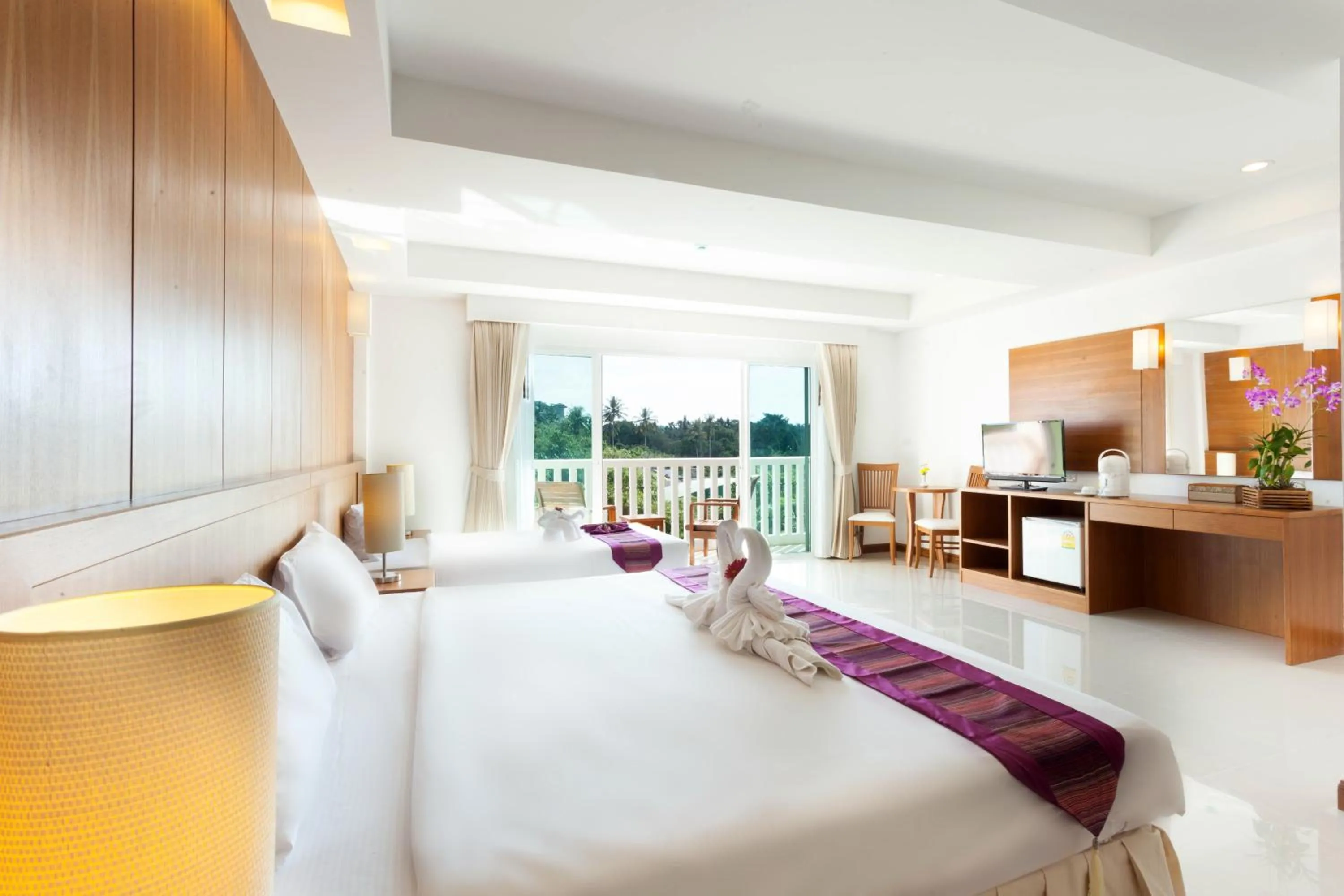 Bed in Rawai Princess Hotel