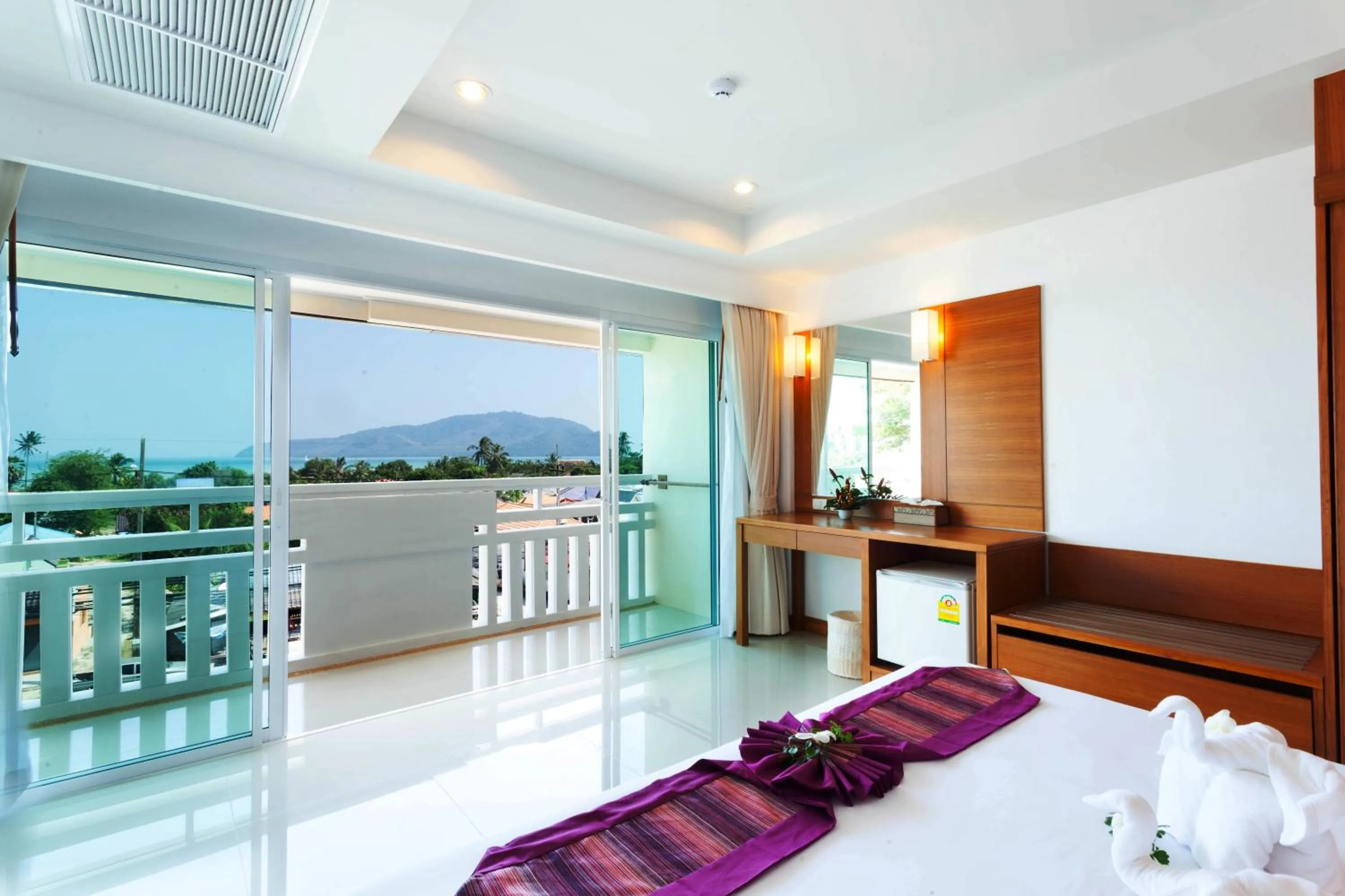 Bed in Rawai Princess Hotel