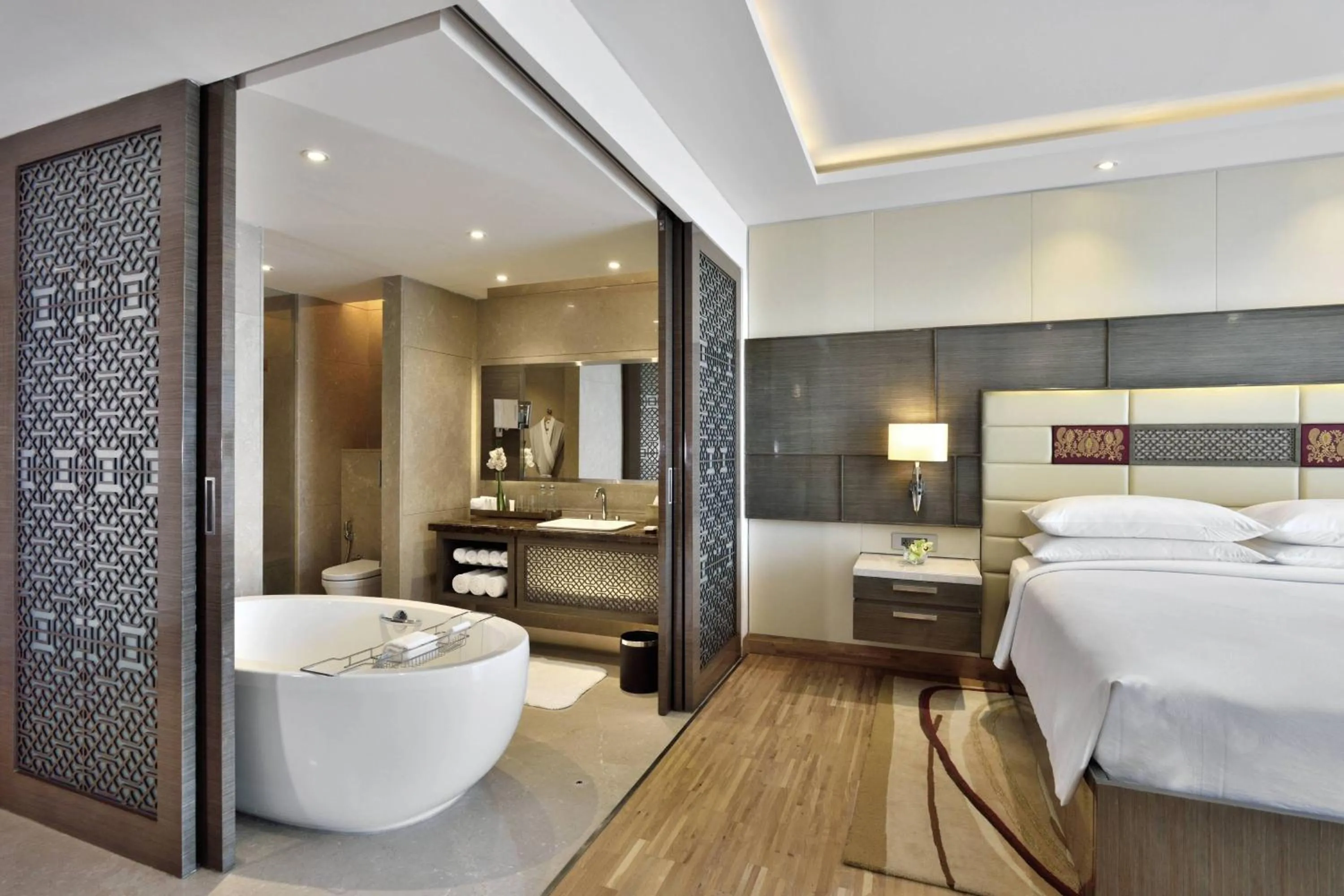 Bathroom, Bed in JW Marriott Mumbai Sahar Airport