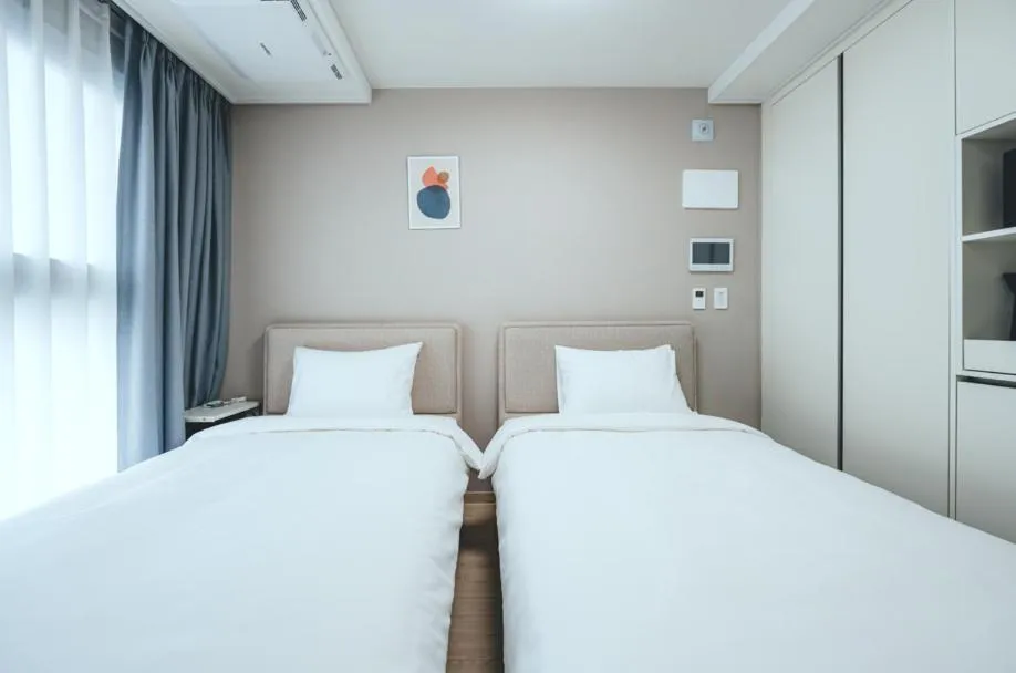 Bed in H Avenue Sasang Station Residence Hotel