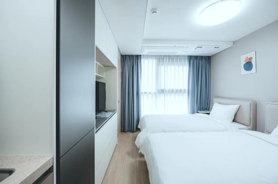 Bed in H Avenue Sasang Station Residence Hotel