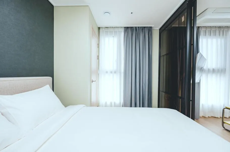 Bed in H Avenue Sasang Station Residence Hotel