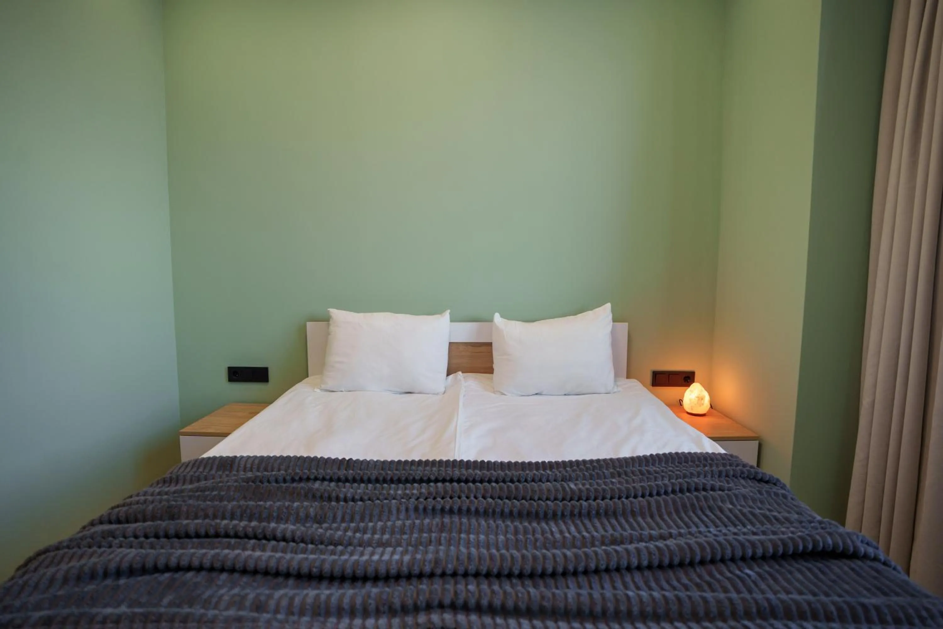 Bed in RIS Central Apartments Yerevan