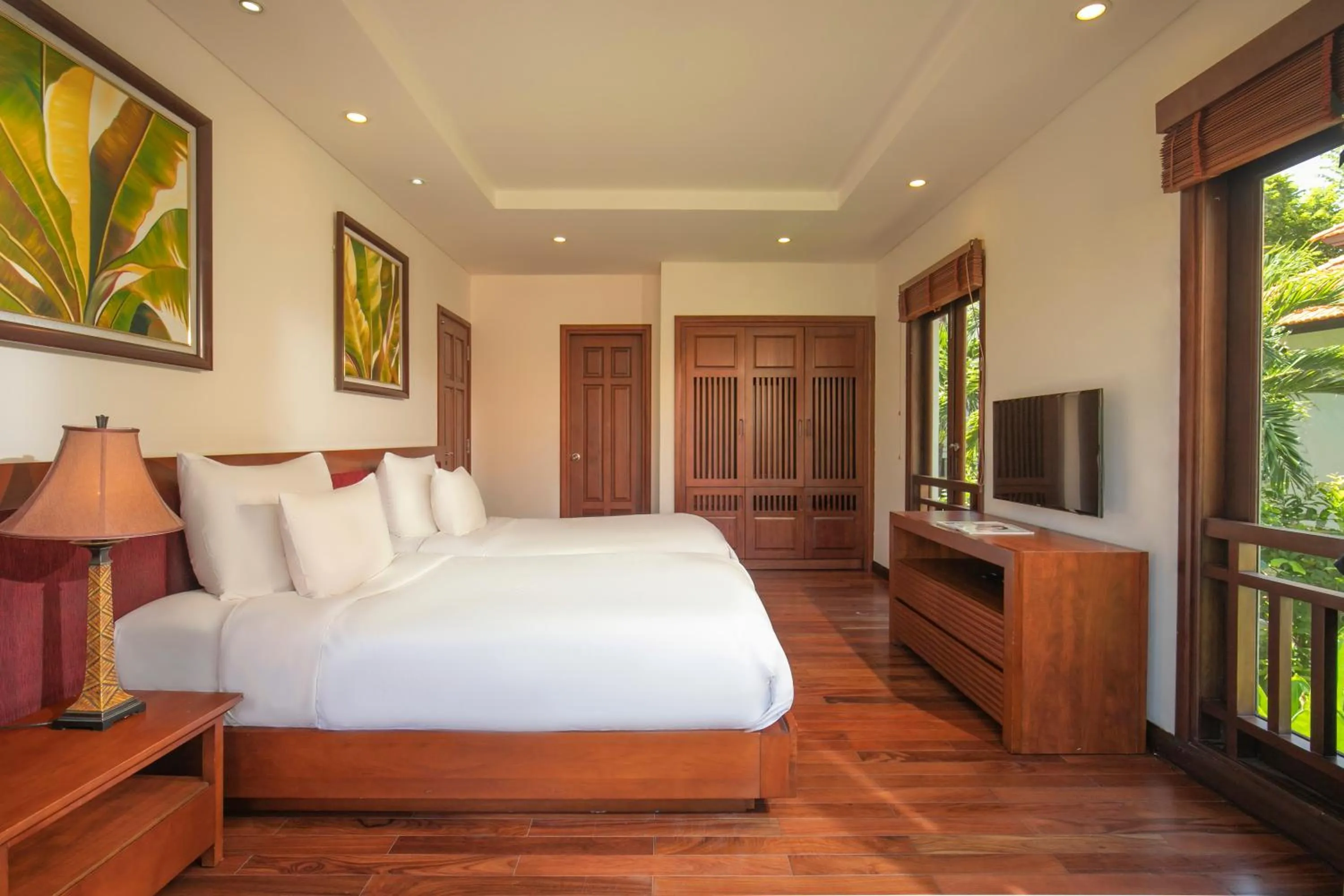 Communal lounge/ TV room, Bed in Purama Villas Luxury Resort Da Nang