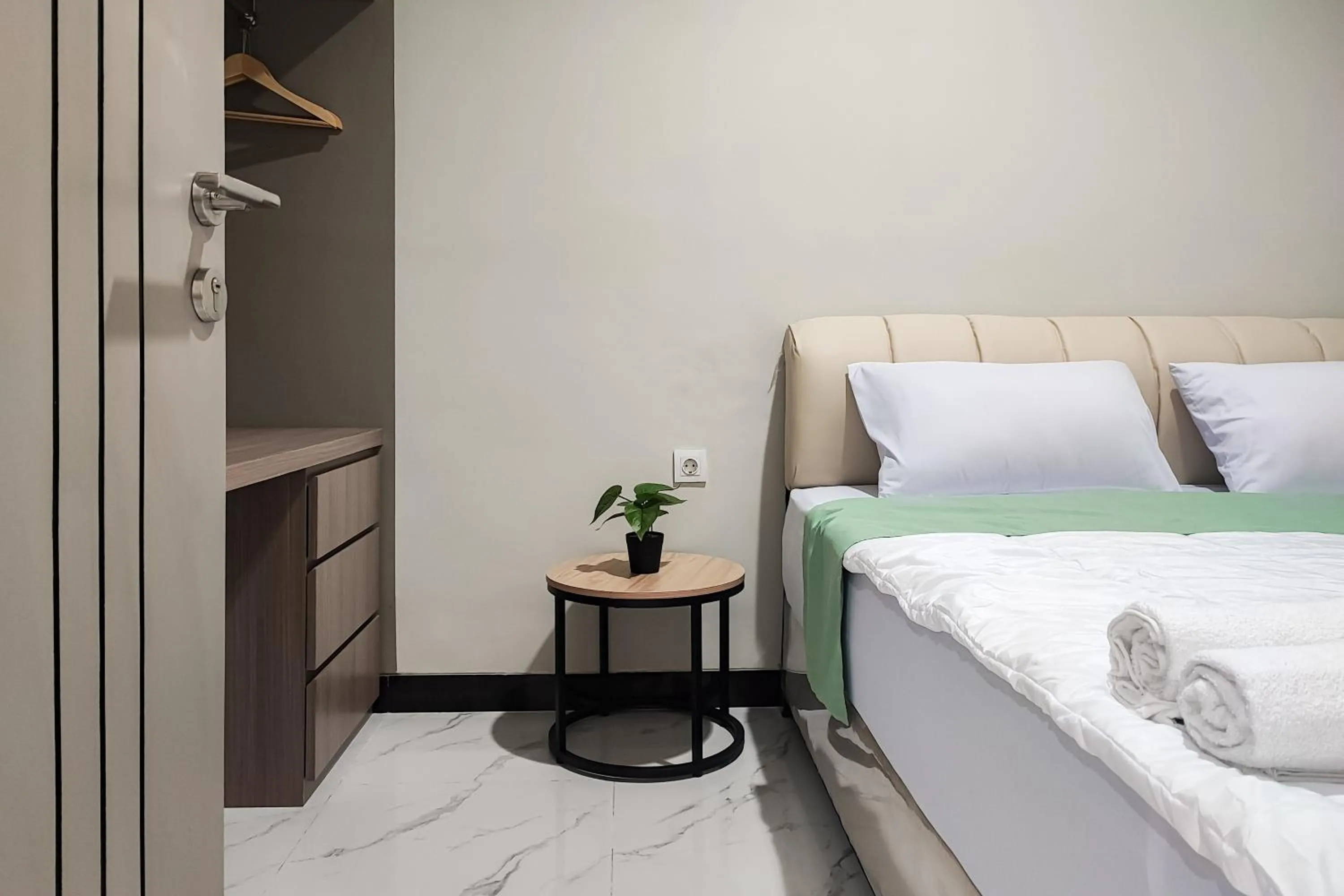 Bedroom in Urbanview Hotel at Pesona Guest House Jambi