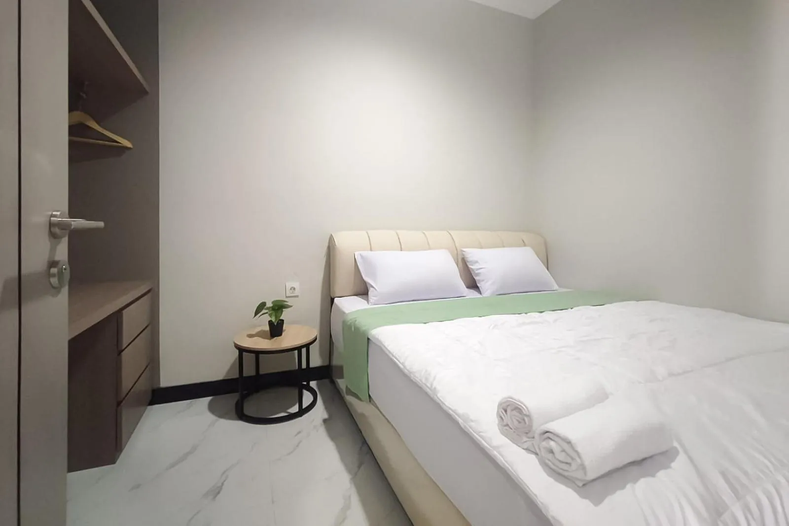 Bedroom in Urbanview Hotel at Pesona Guest House Jambi