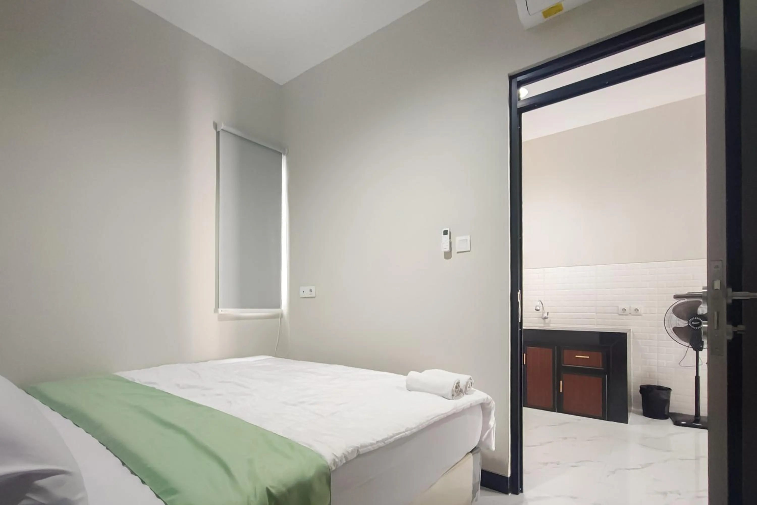Bedroom in Urbanview Hotel at Pesona Guest House Jambi