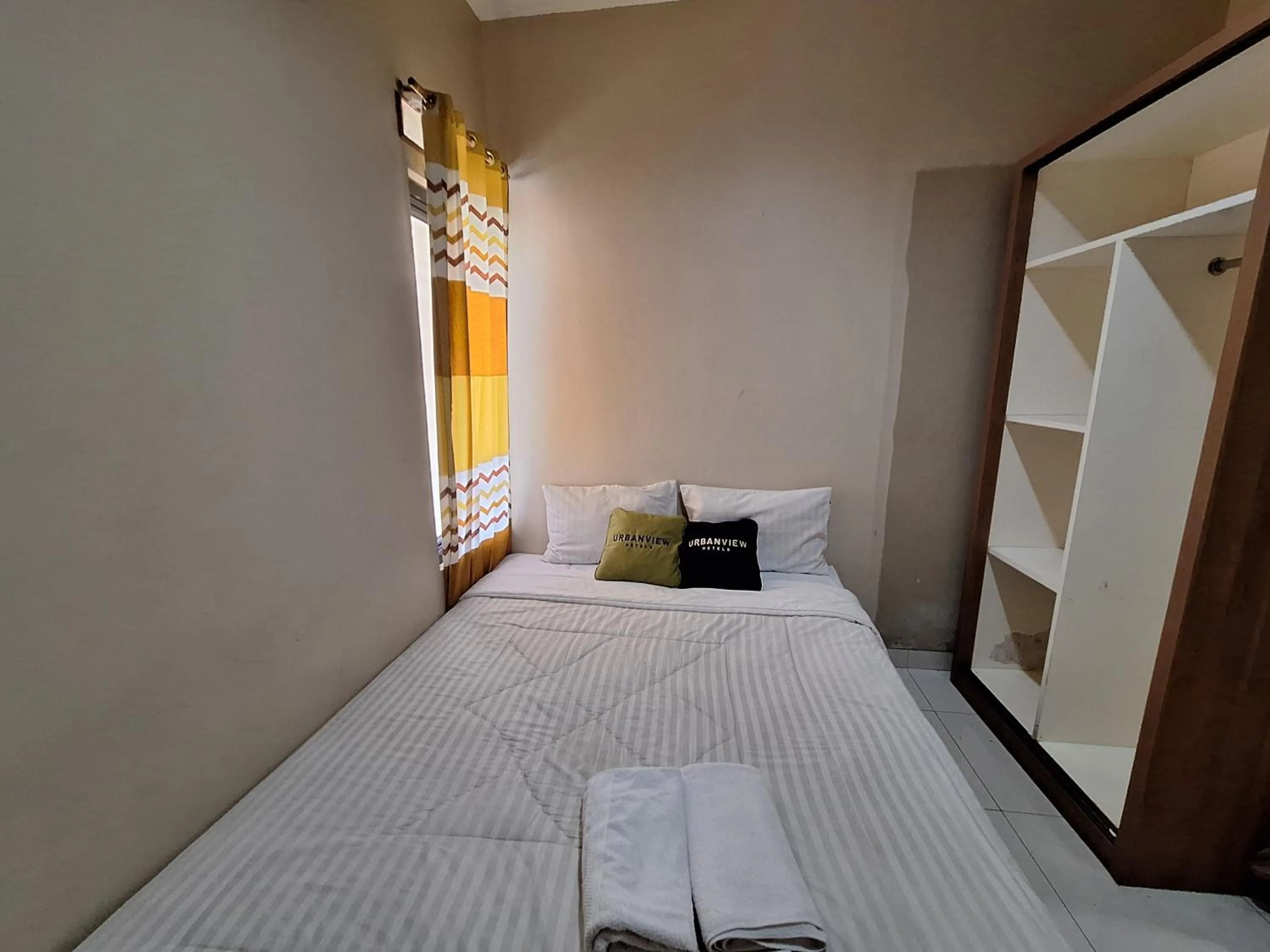 Bedroom, Bed in Urbanview Hotel Inkoppabri Cisarua Puncak