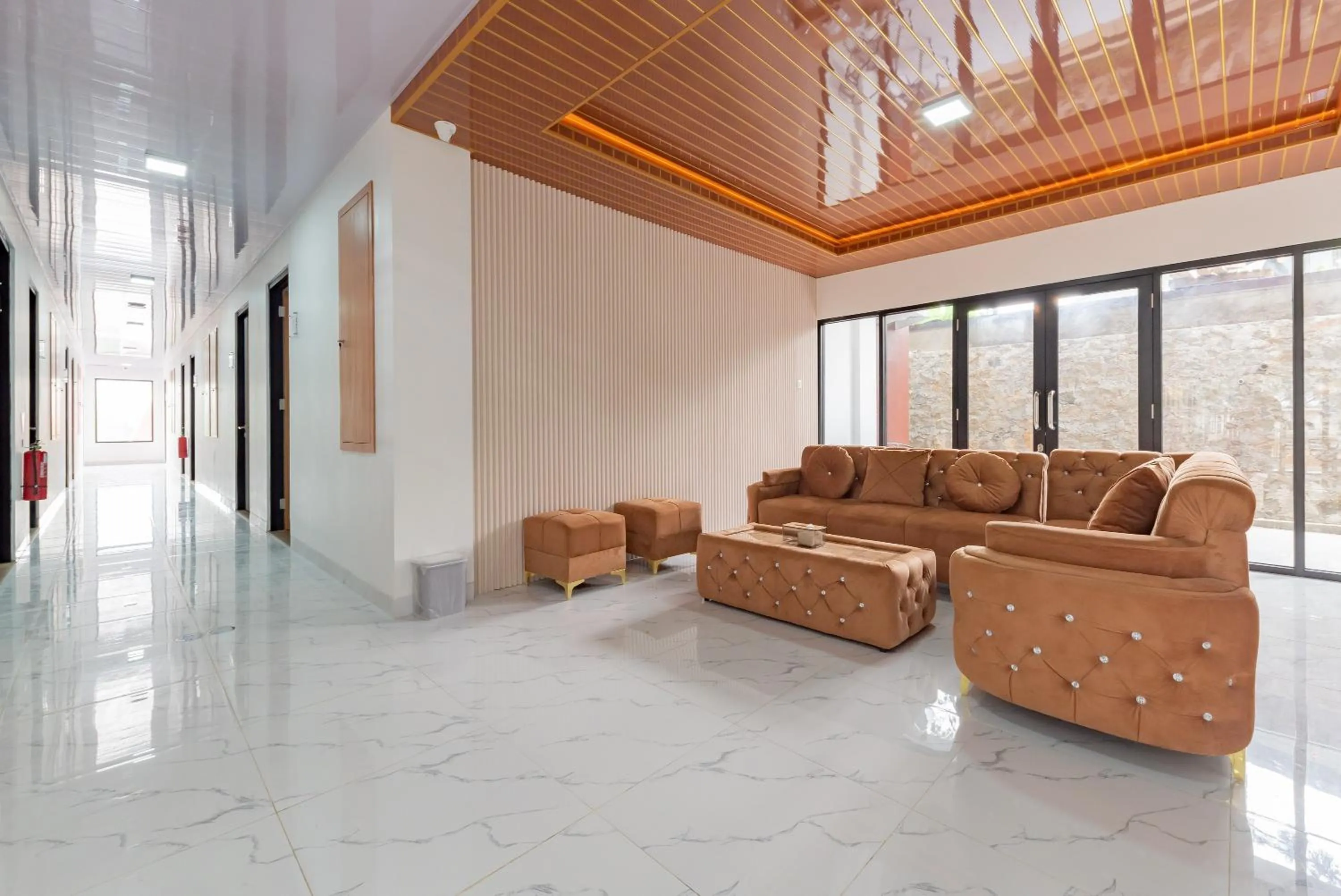 Seating area in Urbanview Hotel Inkoppabri Cisarua Puncak