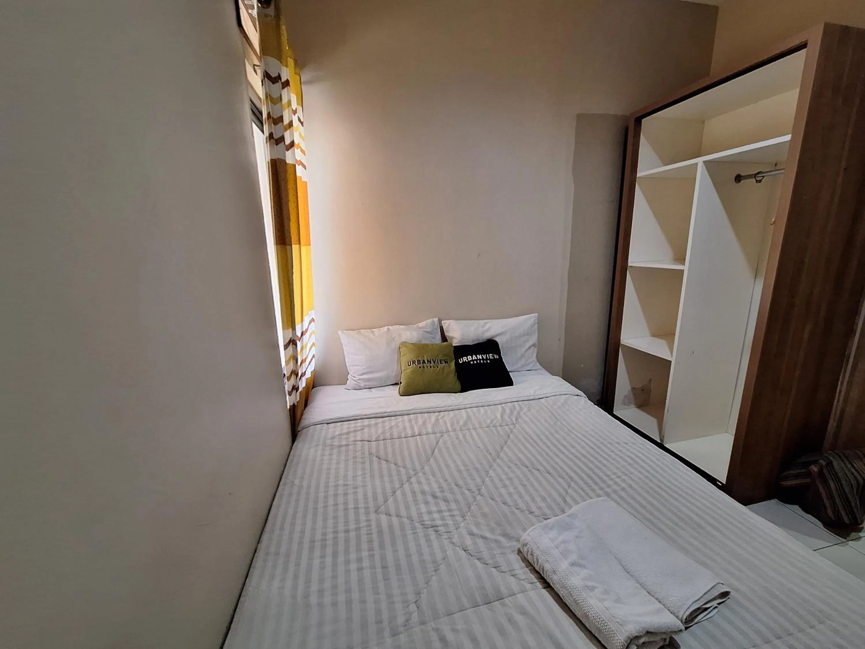 Bedroom, Bed in Urbanview Hotel Inkoppabri Cisarua Puncak