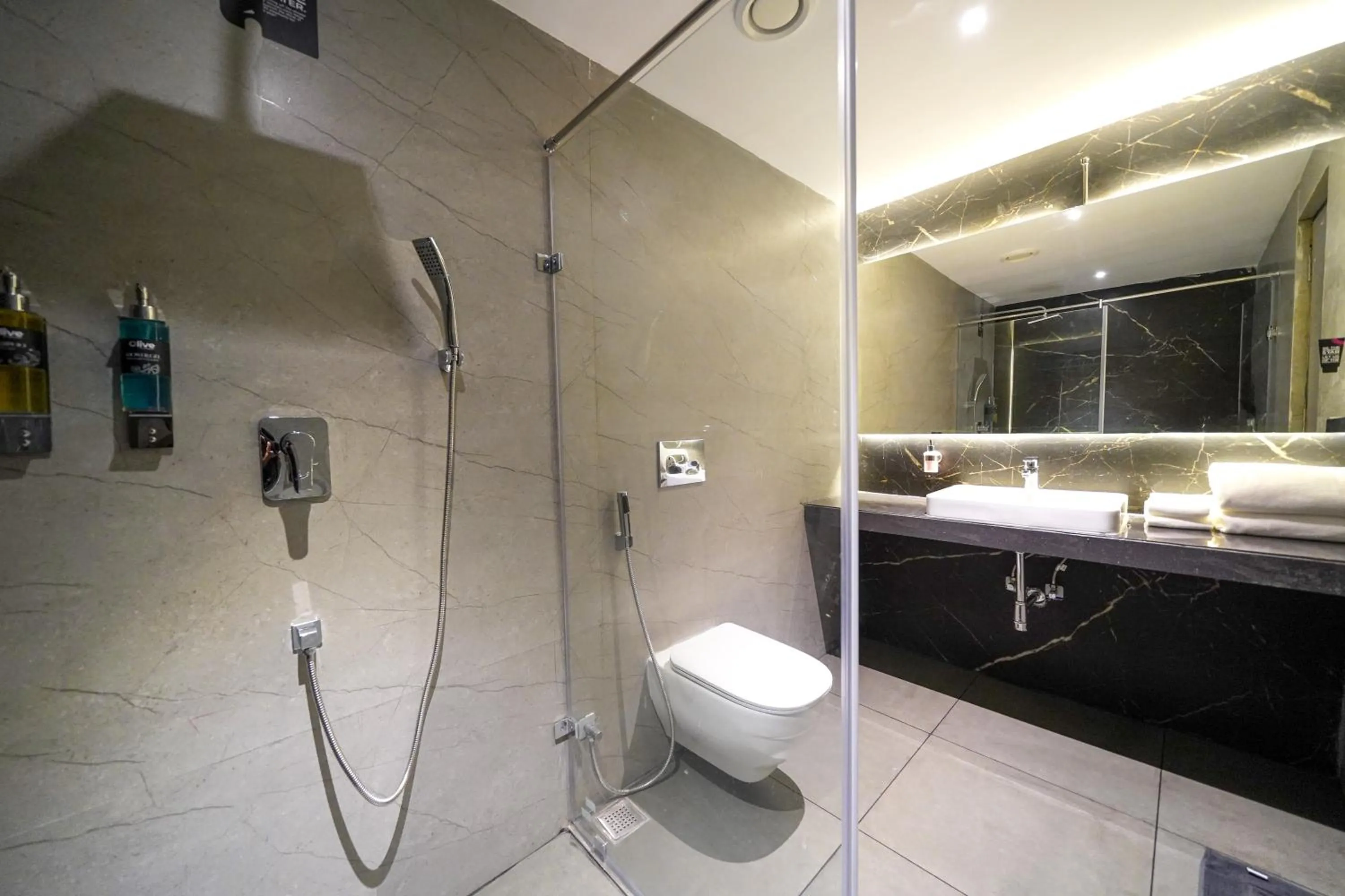 Toilet in Olive Hotel Benz Circle, Vijayawada by Embassy Group