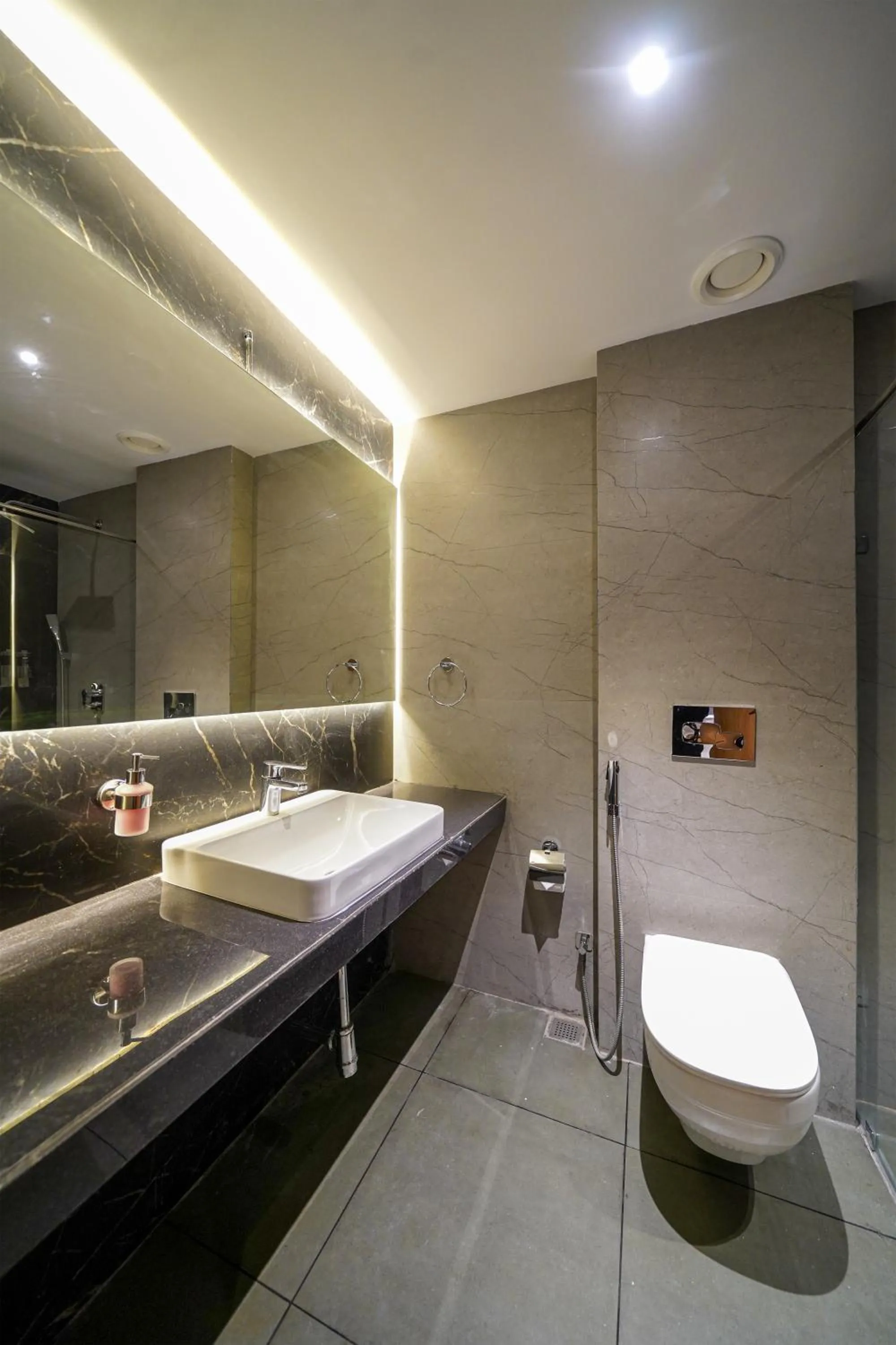 Toilet in Olive Hotel Benz Circle, Vijayawada by Embassy Group