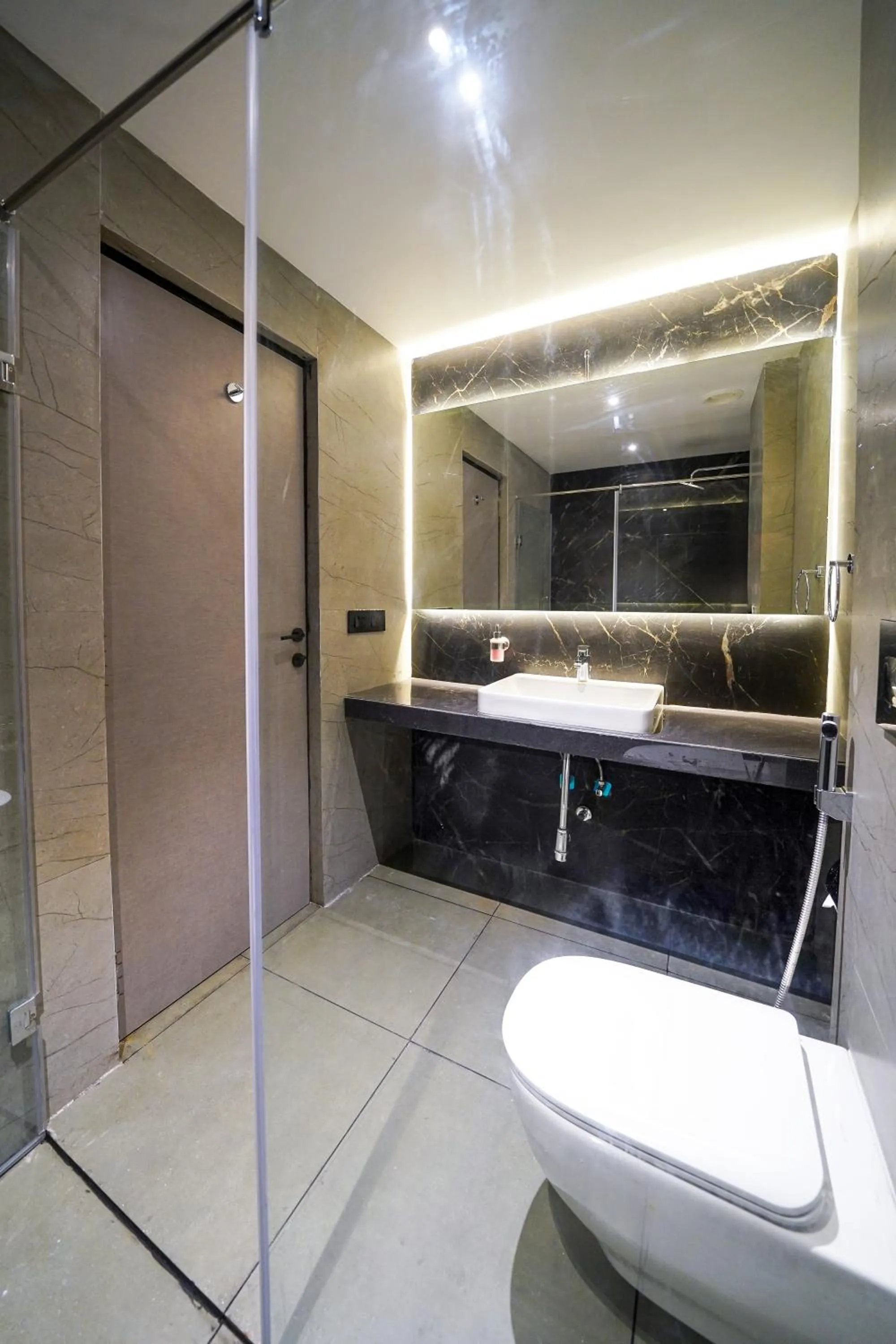 Toilet in Olive Hotel Benz Circle, Vijayawada by Embassy Group