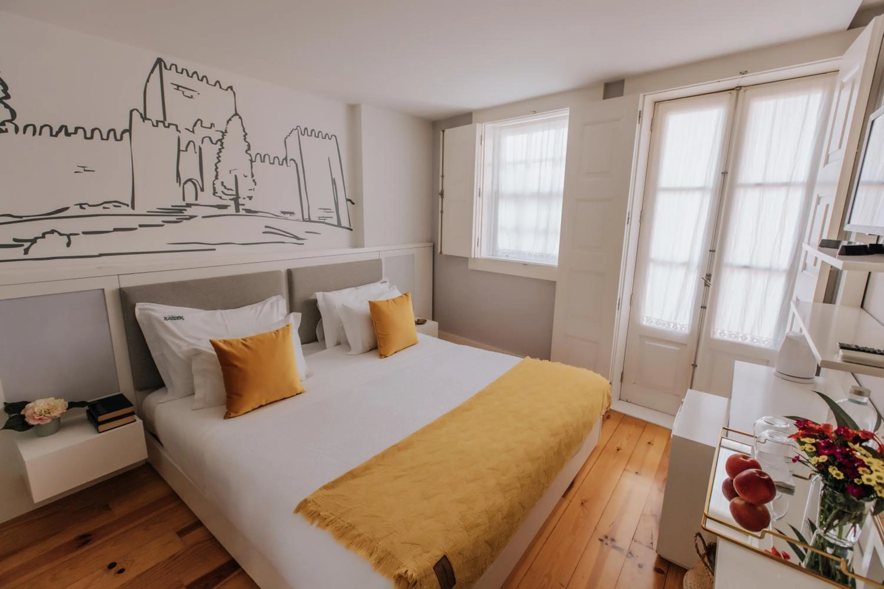 Bed in Trovador Guest House