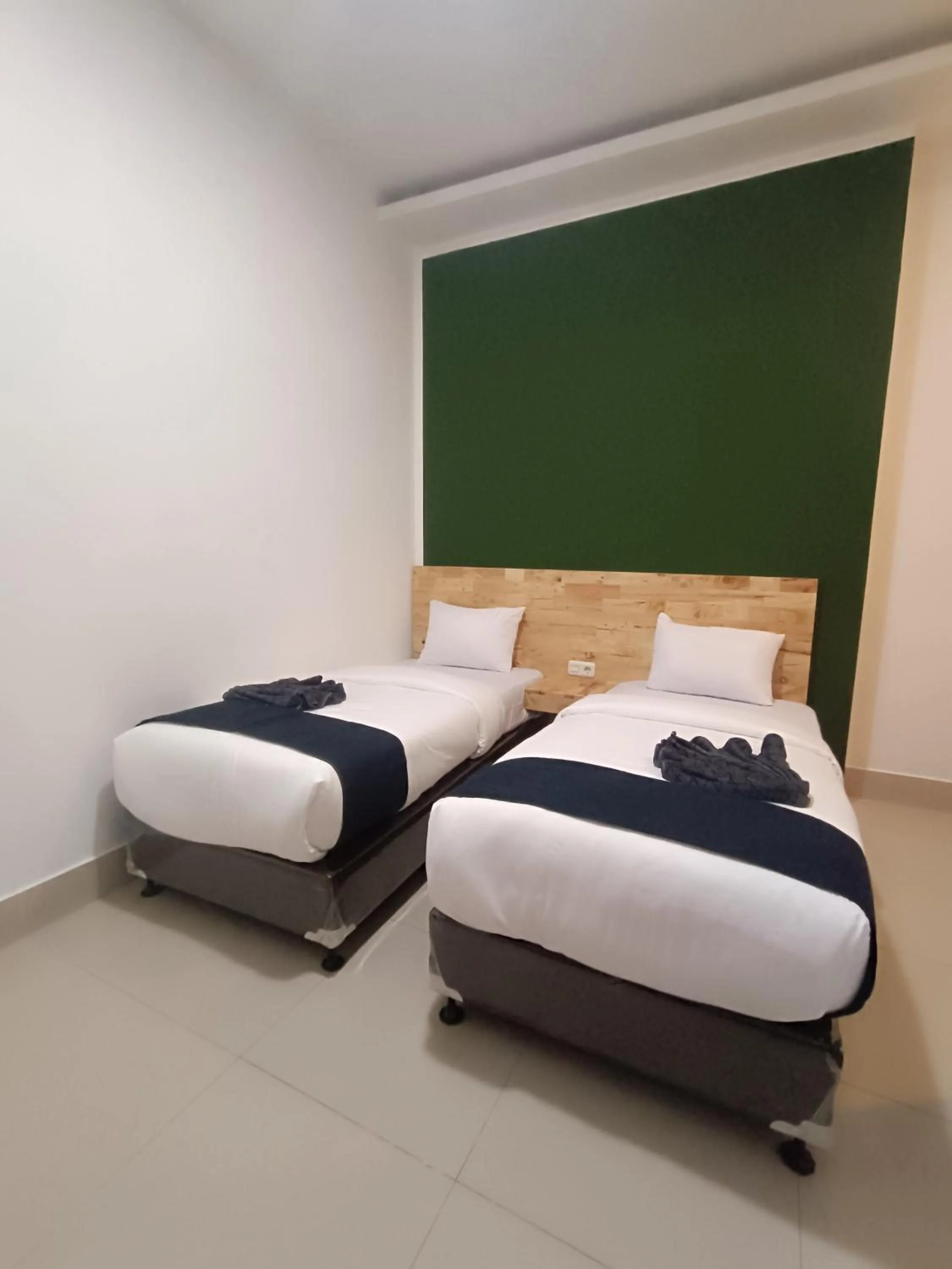 Bed in D'Hills Hotel