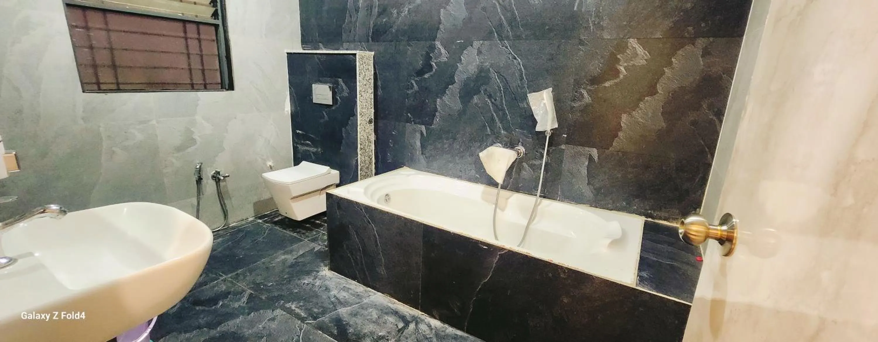 Toilet in Hotel Sahara Residency