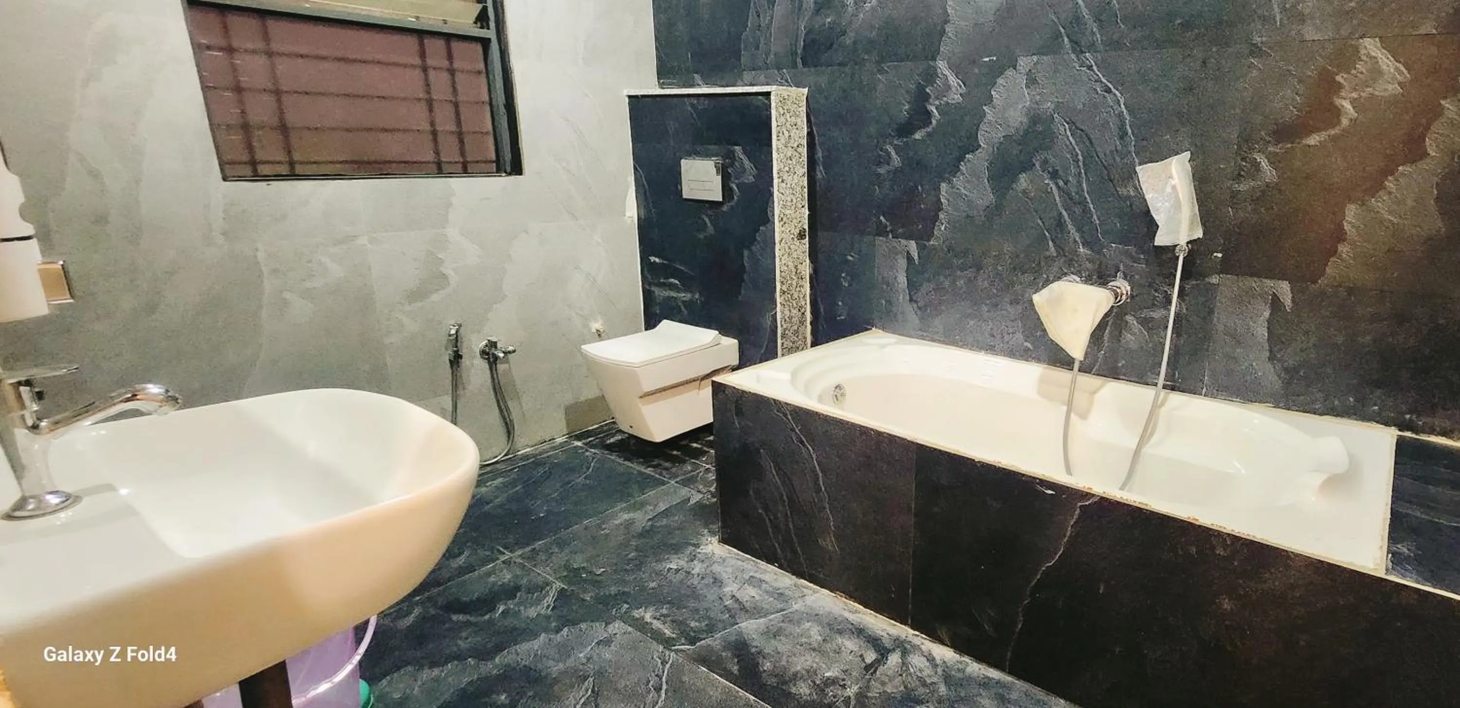 Toilet in Hotel Sahara Residency