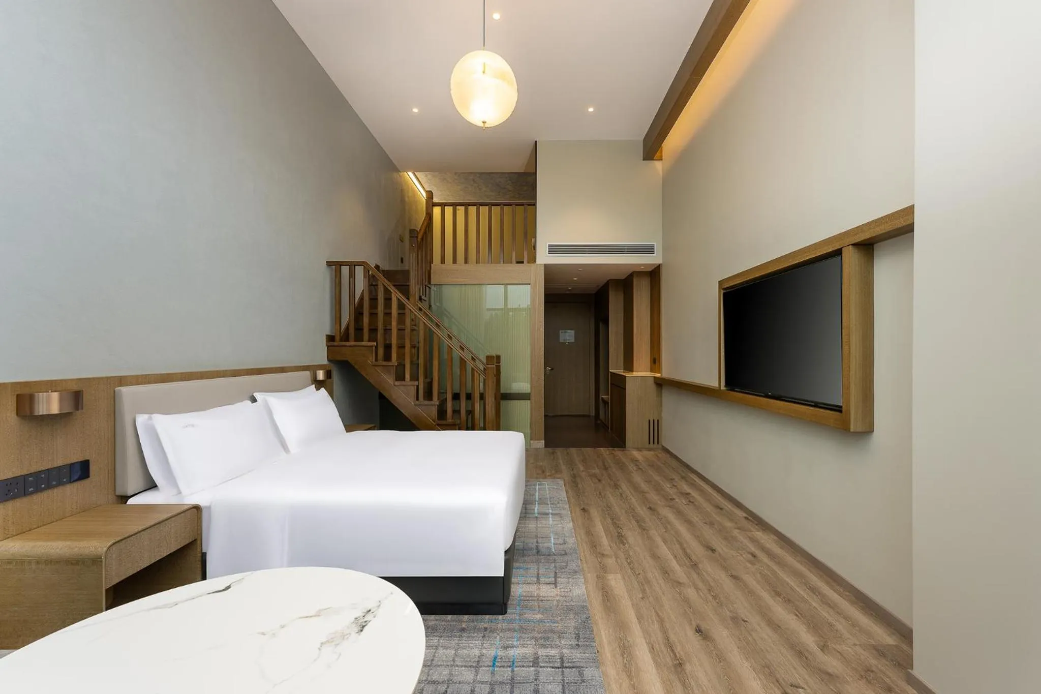 TV and multimedia in Holiday Inn Jiuhua Mountain Hot Spring by IHG