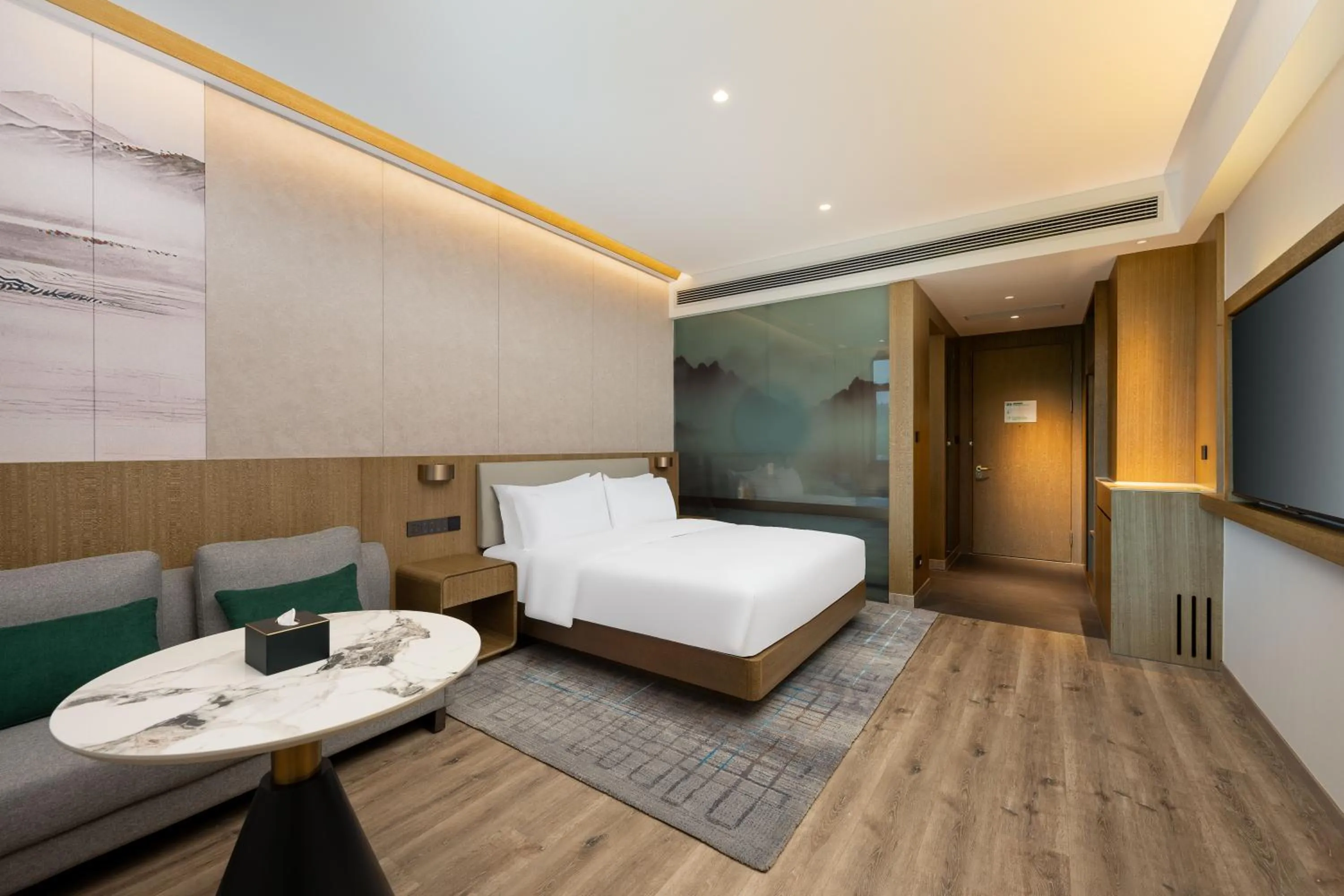 Bed in Holiday Inn Jiuhua Mountain Hot Spring by IHG