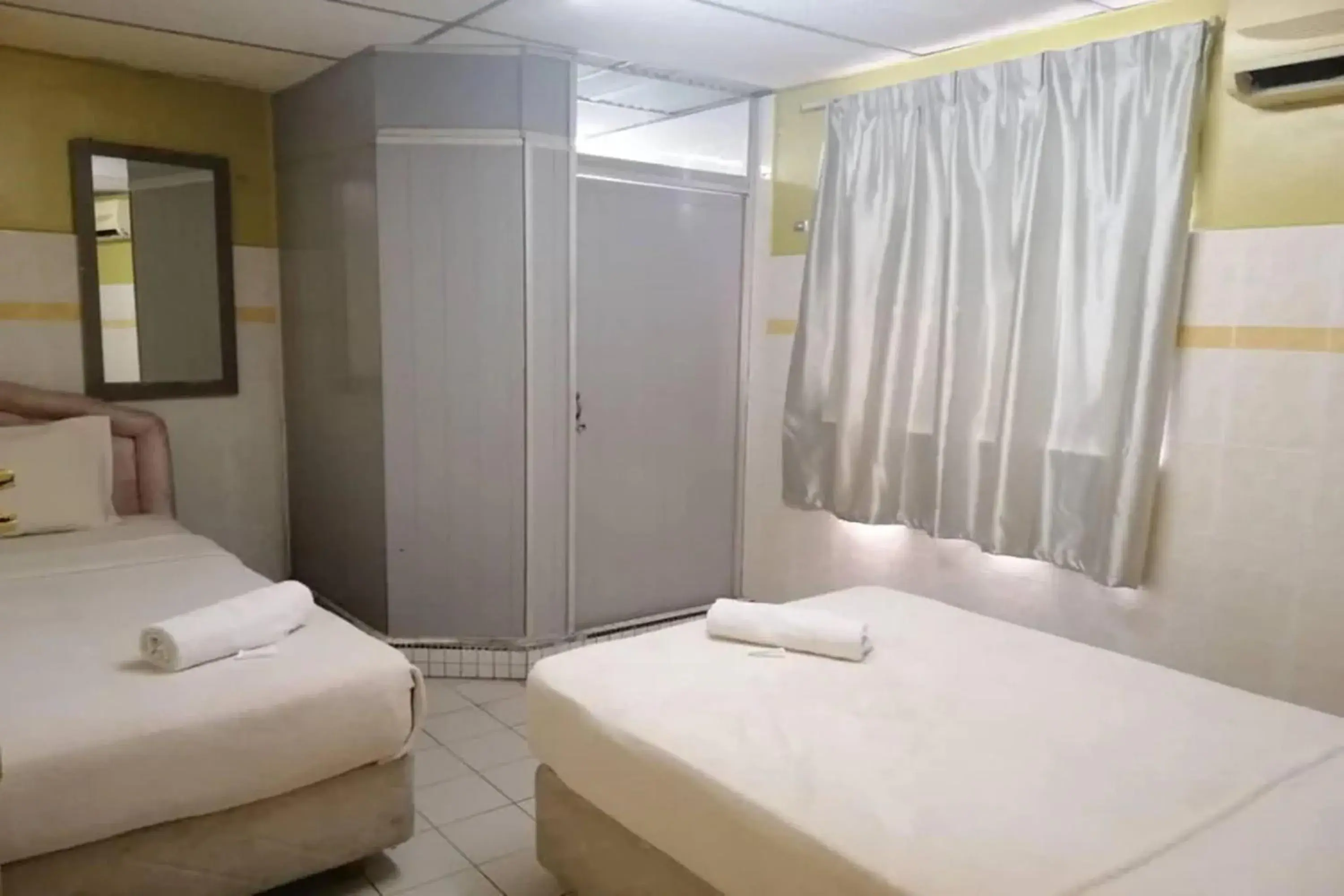 Standard Twin Room in Hotel Dlima House Bukit Bintang Standard Twin Room in Hotel Dlima House Bukit Bintang